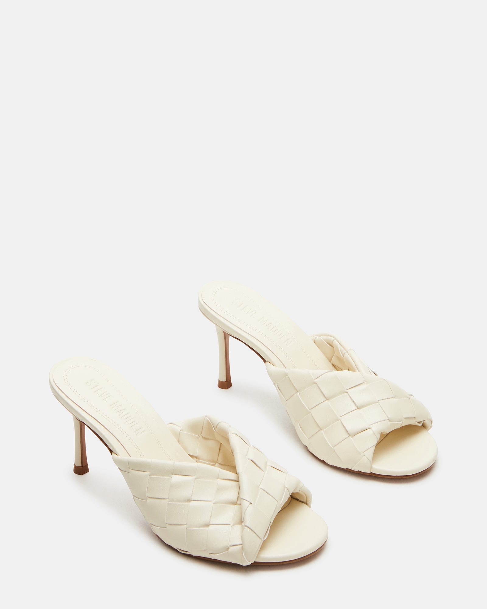 Top-down angle highlighting slip-on mule style and cushioned interior