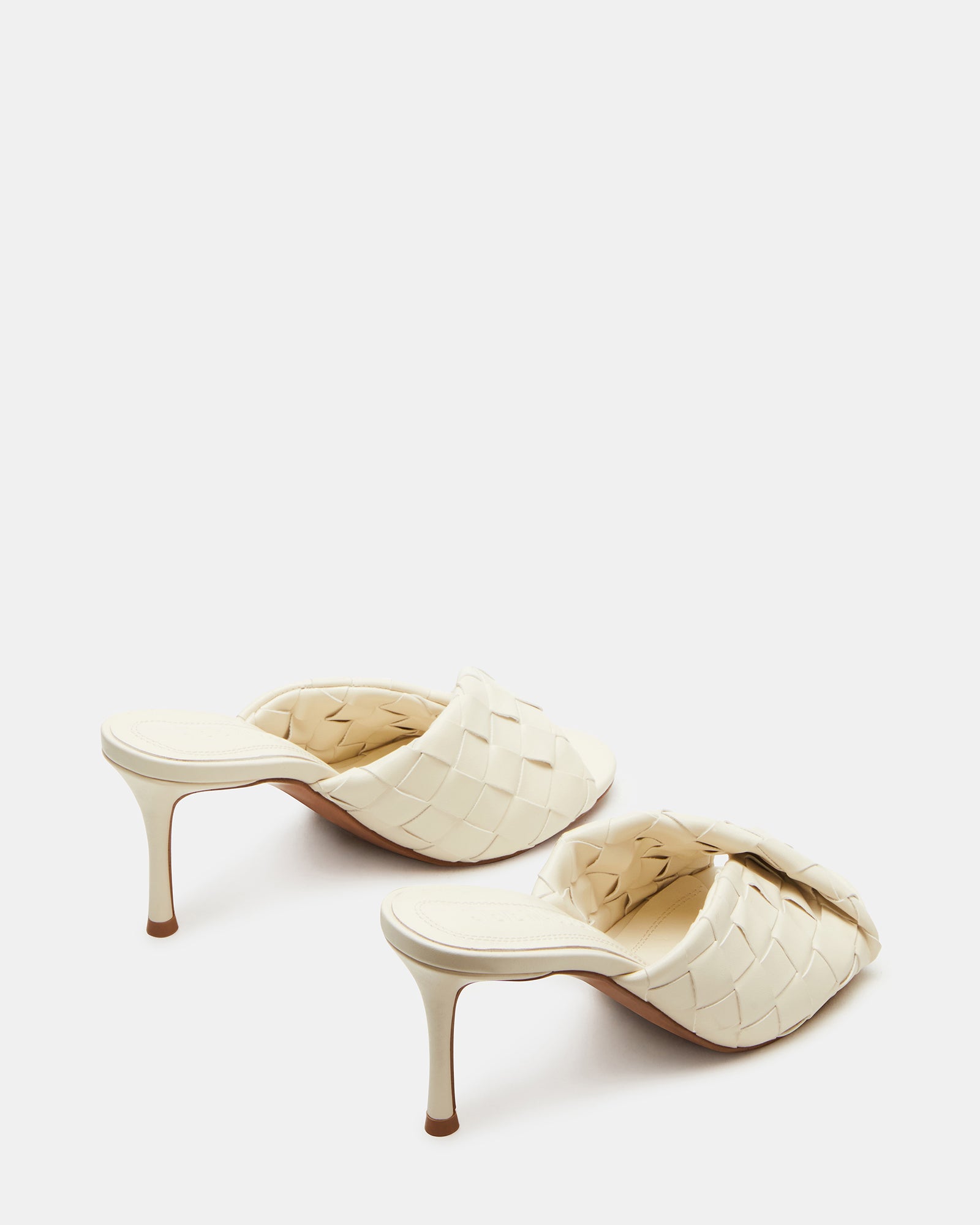 Top-down angle highlighting slip-on mule style and cushioned interior