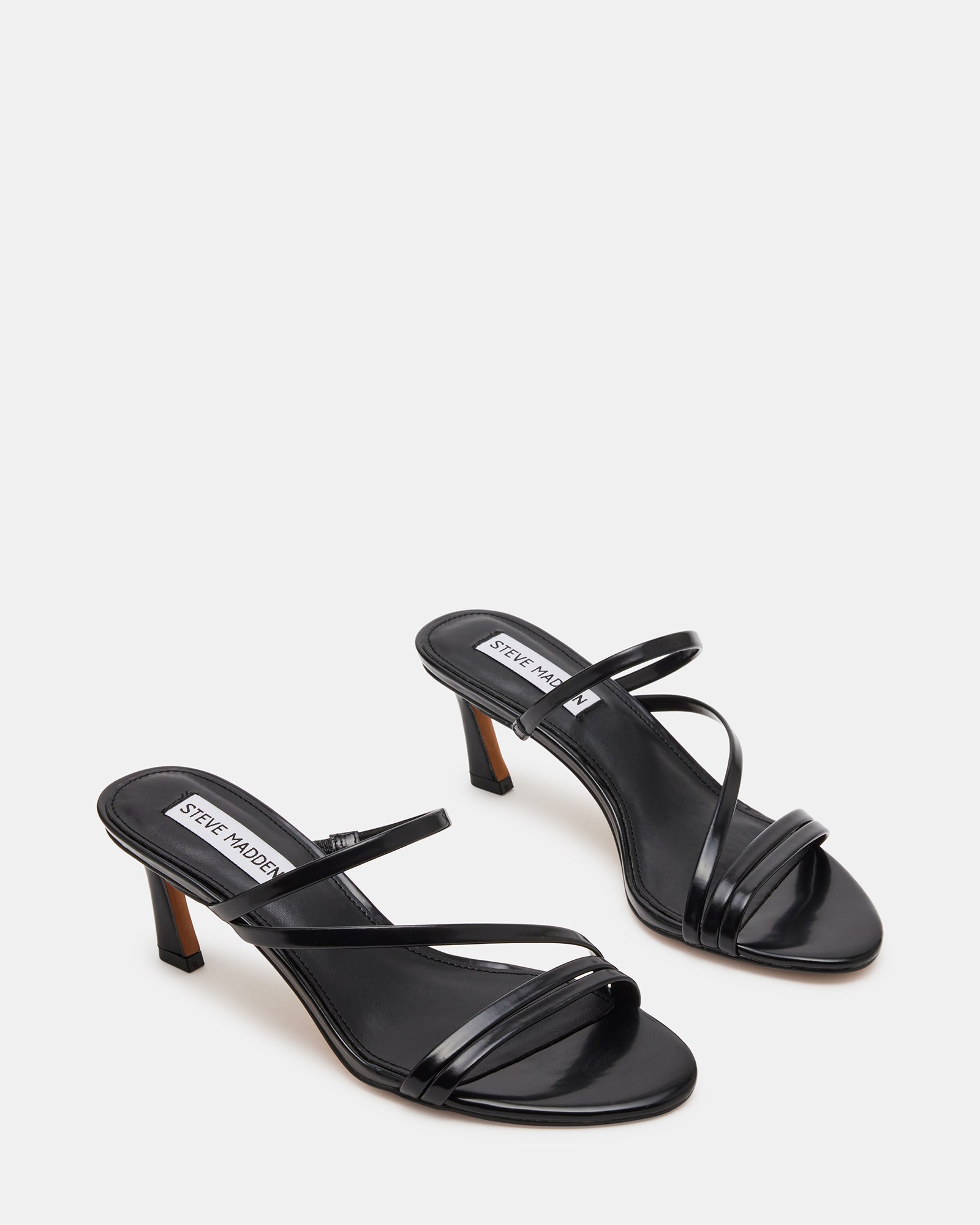 Lamora mules styled with jeans for a chic daytime look