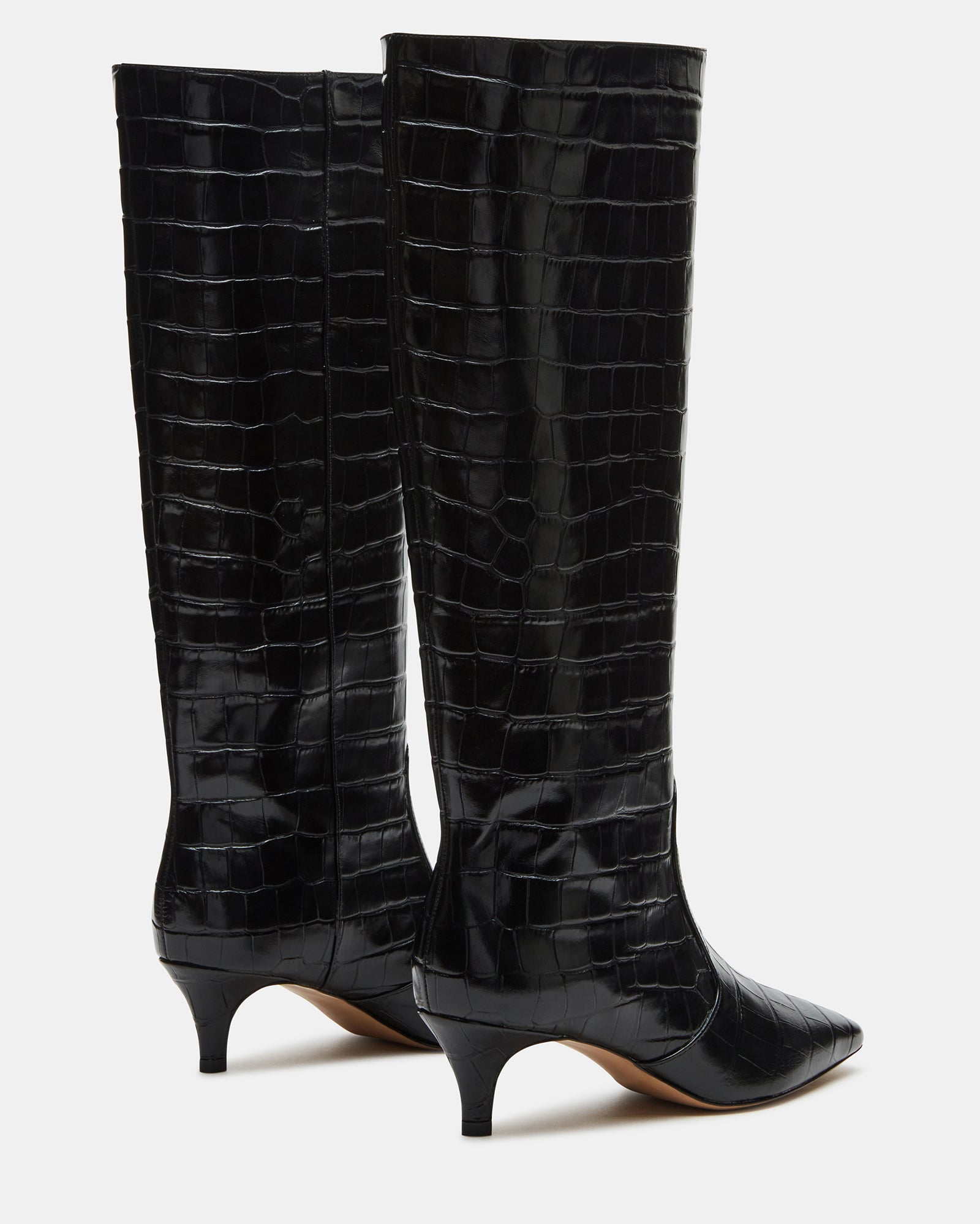 Side view of stylish black knee high cowboy boots suitable for various occasions.