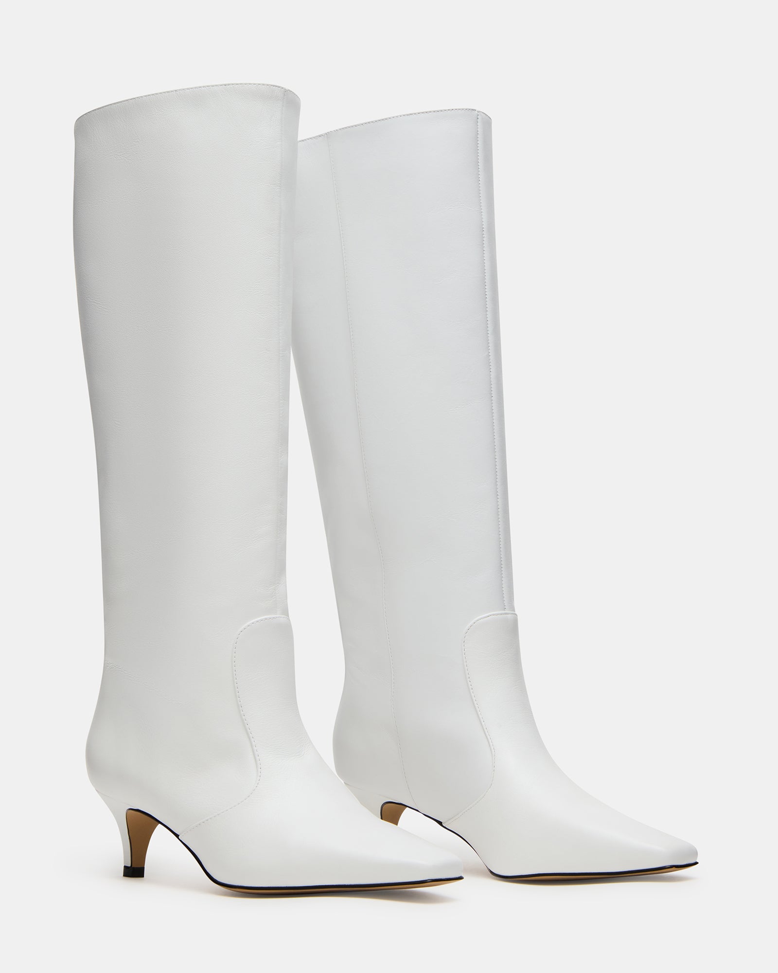 Close-up of boot toe and heel showcasing the square shape and sleek kitten heel.