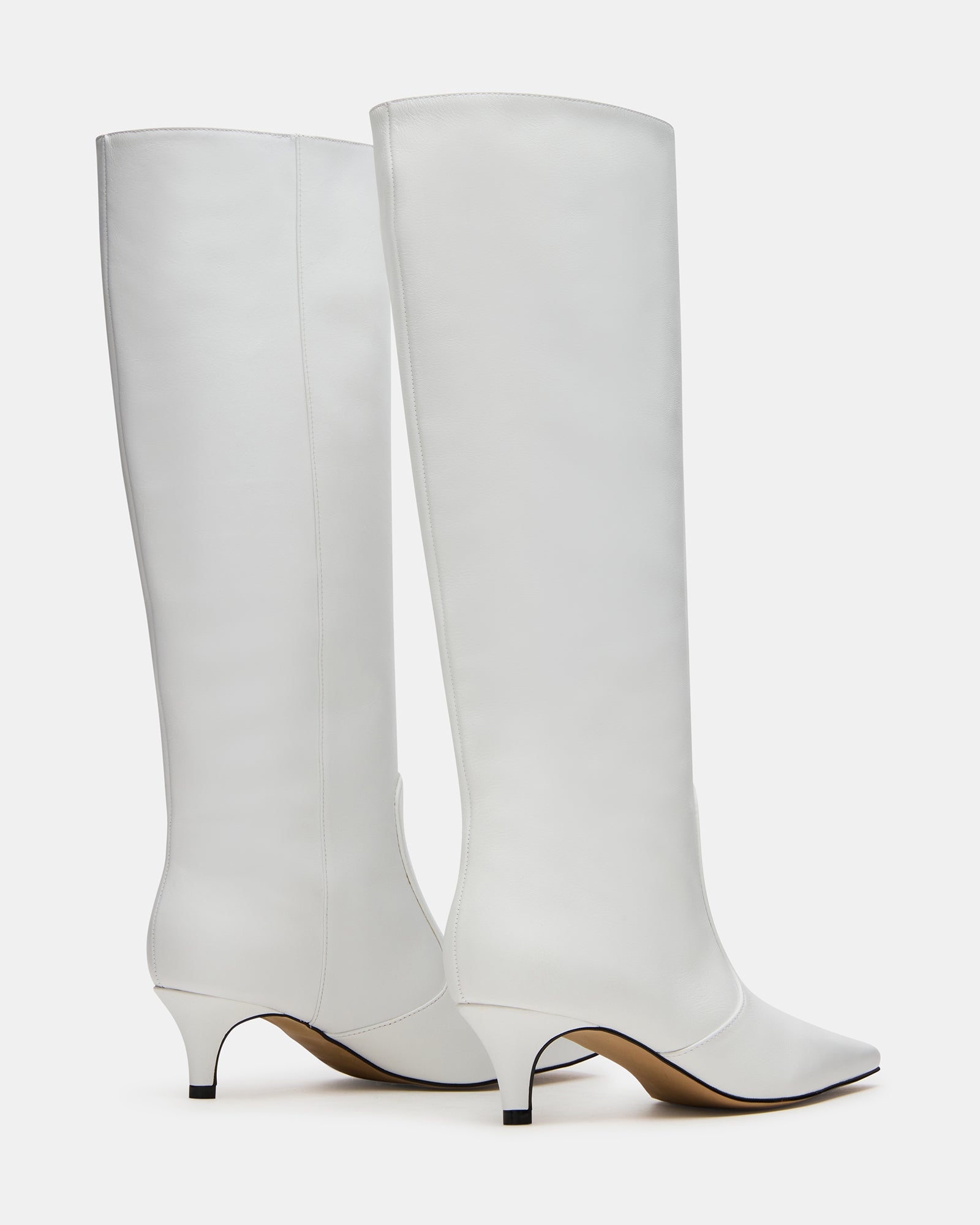 Close-up of boot toe and heel showcasing the square shape and sleek kitten heel.