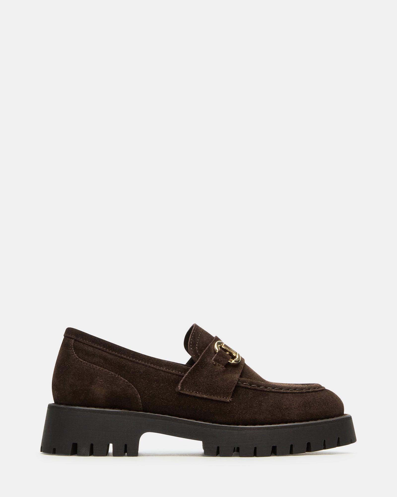 Brown suede platform loafers styled with jeans for a casual look