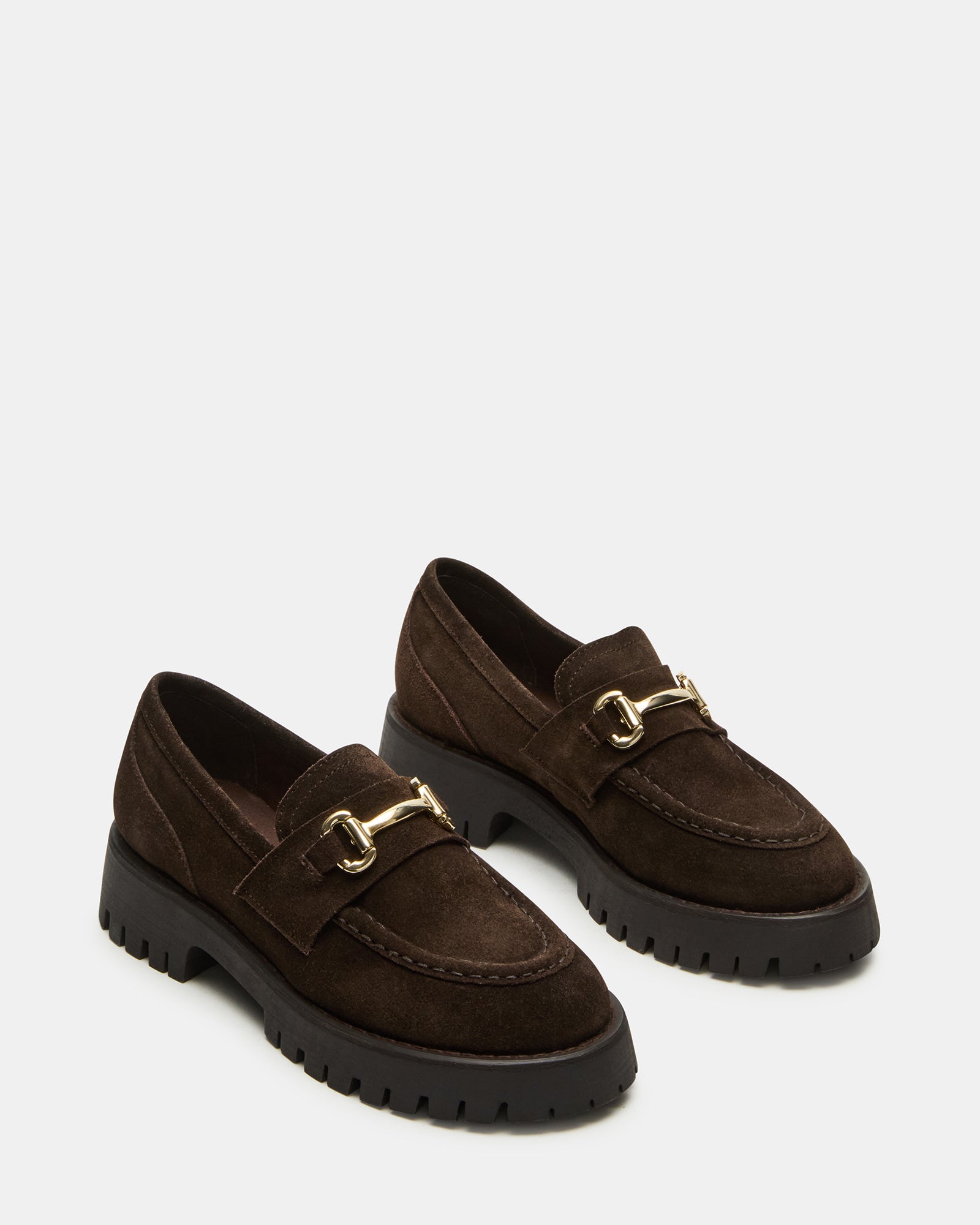 Side profile showing chunky lug sole and heel height