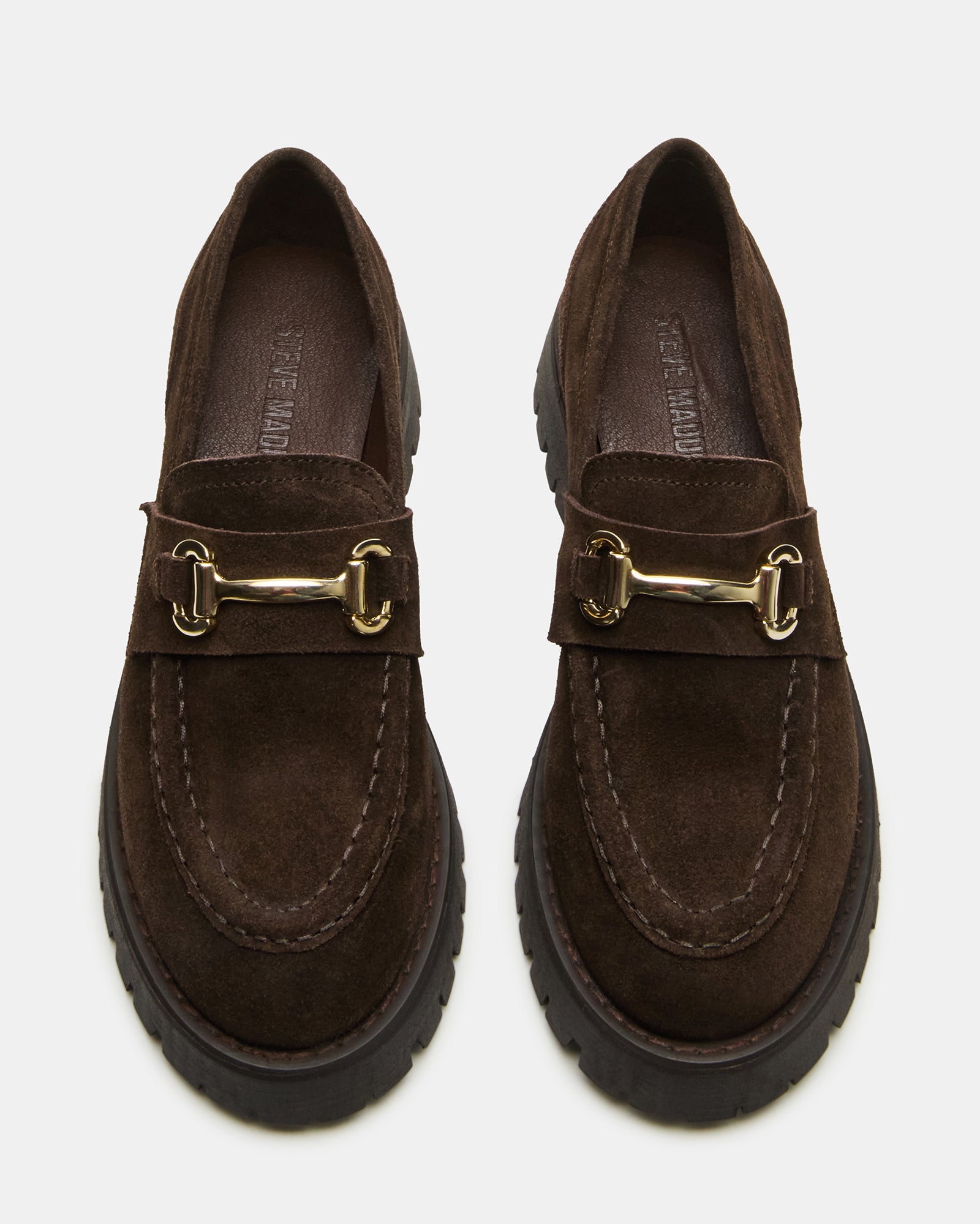 Close-up of horsebit hardware on LANDO penny loafers