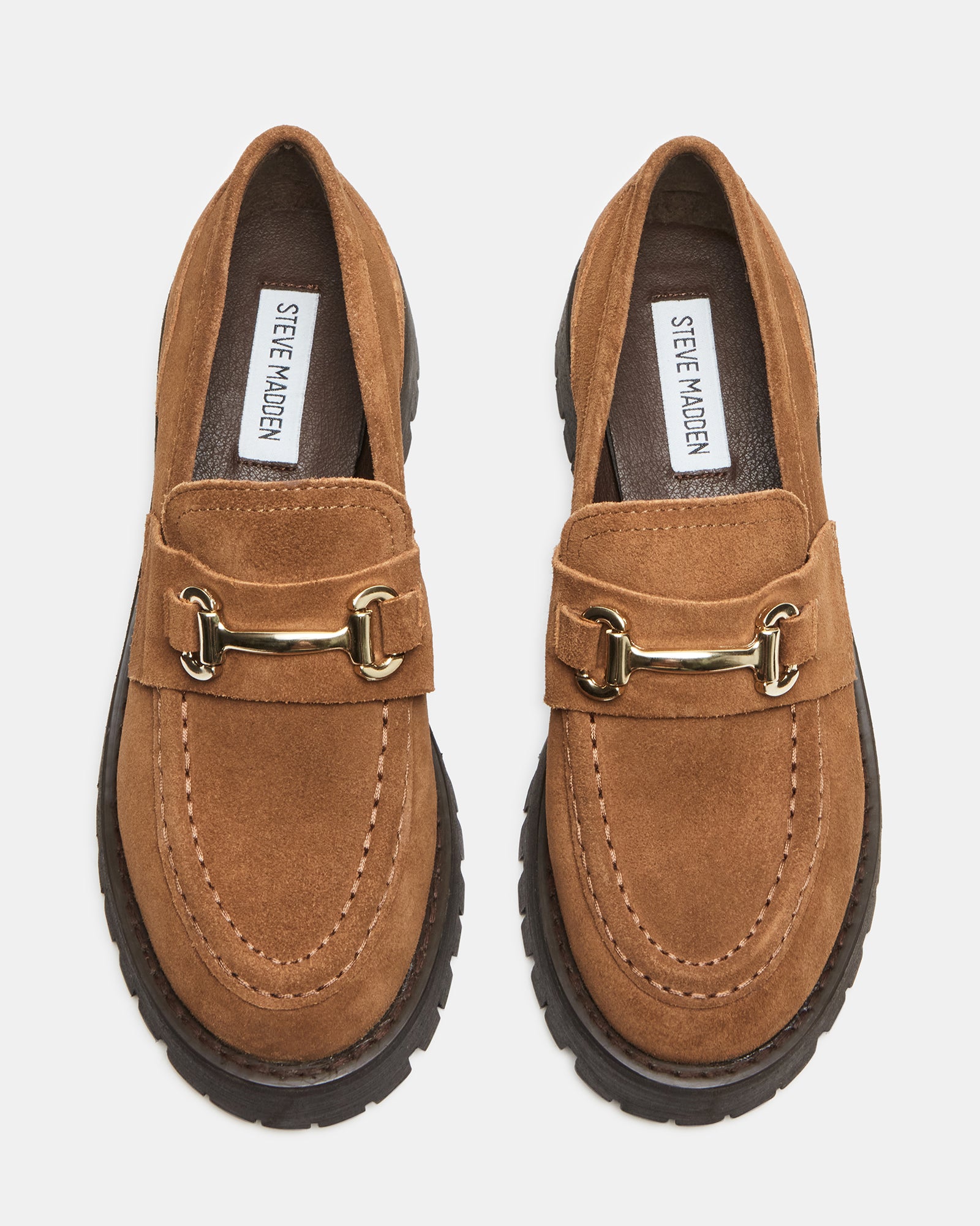 LANDO loafers being worn at a casual outdoor brunch setting.