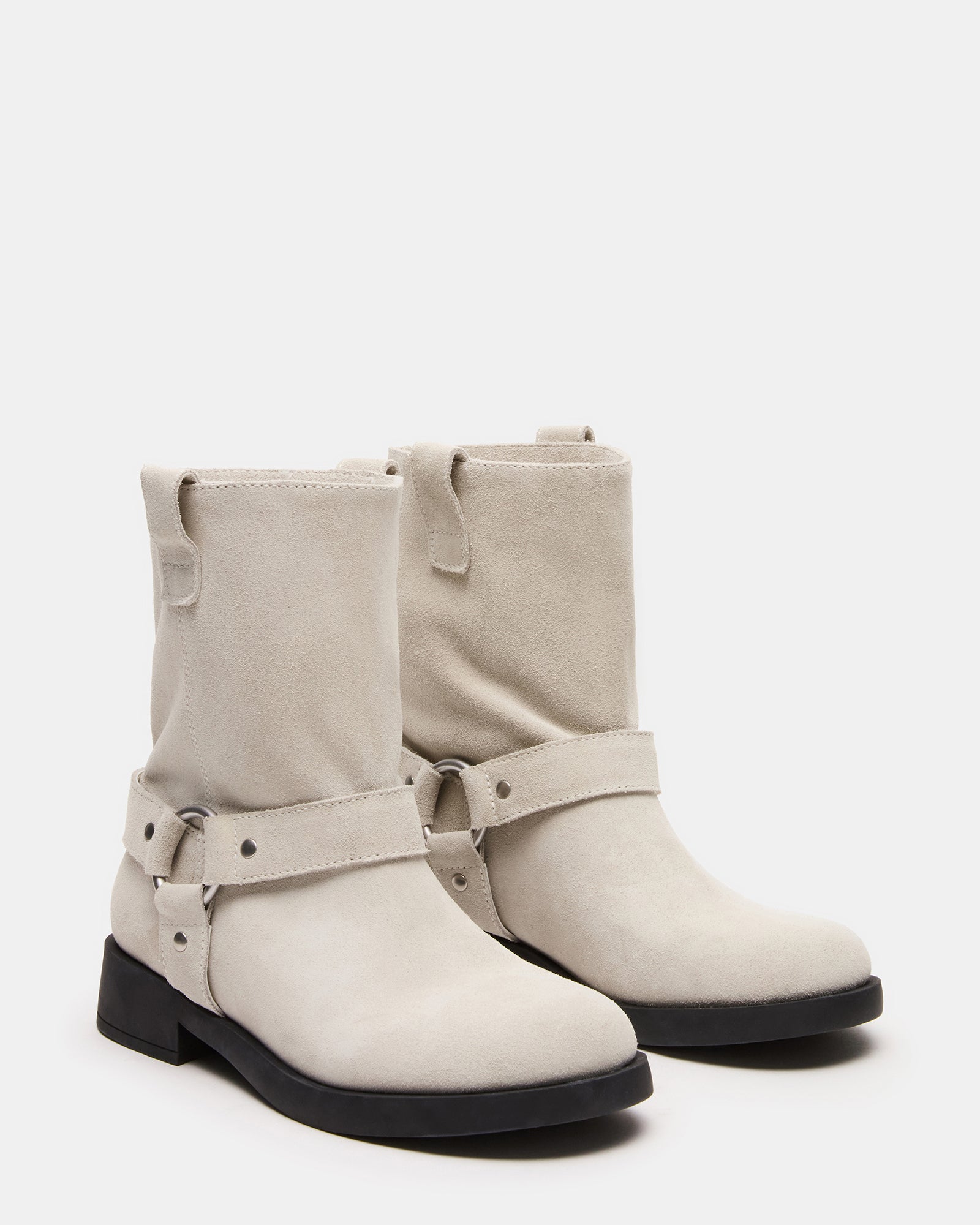 Close-up of the suede texture and heel design on these womens boots