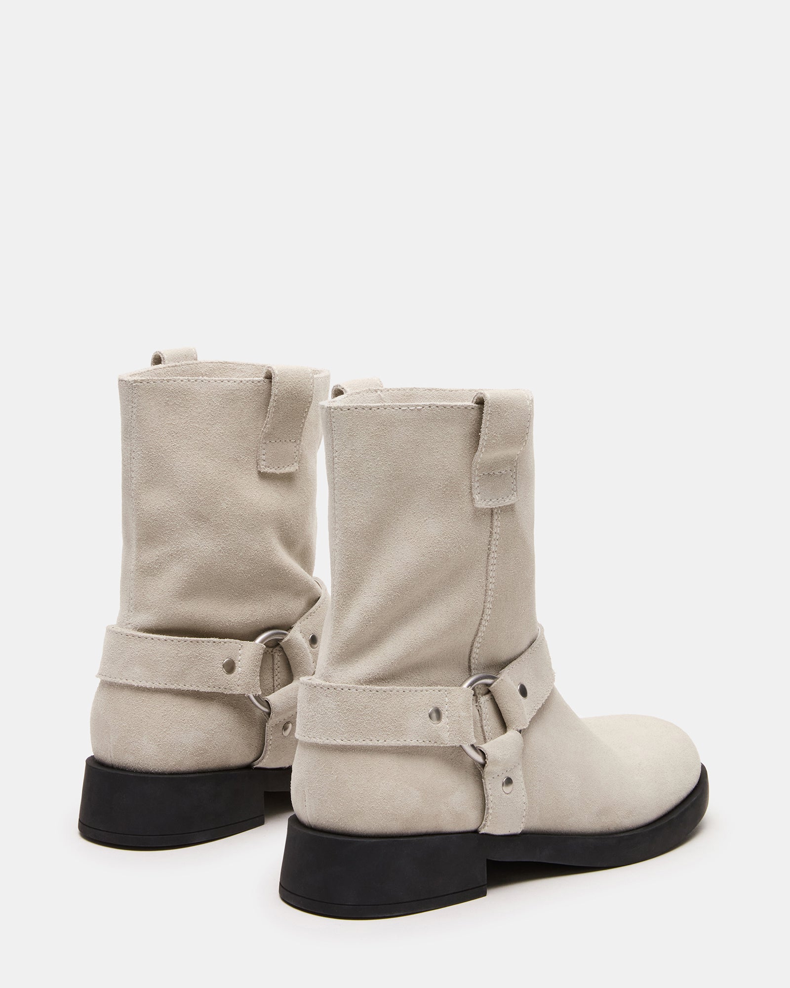 Close-up of the suede texture and heel design on these womens boots