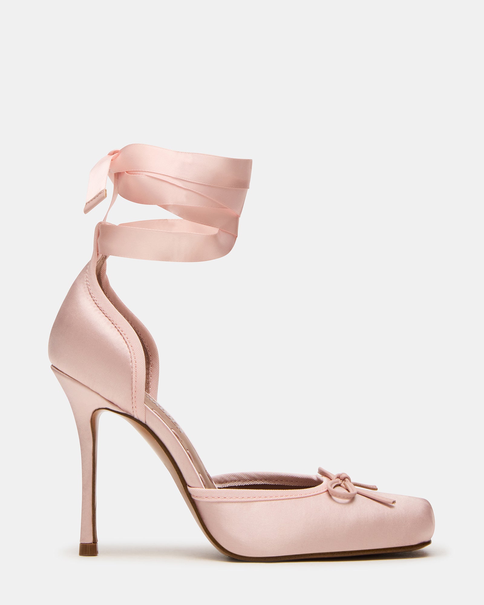 Front view of light pink high heel shoes with satin texture