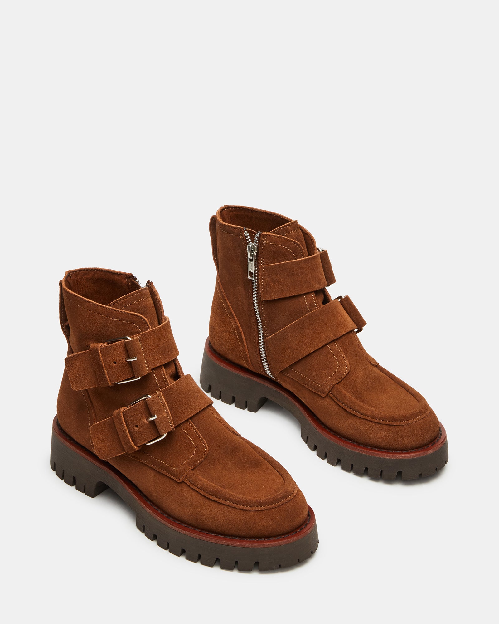 Chestnut womens ankle boots styled with jeans on a rugged California trail.