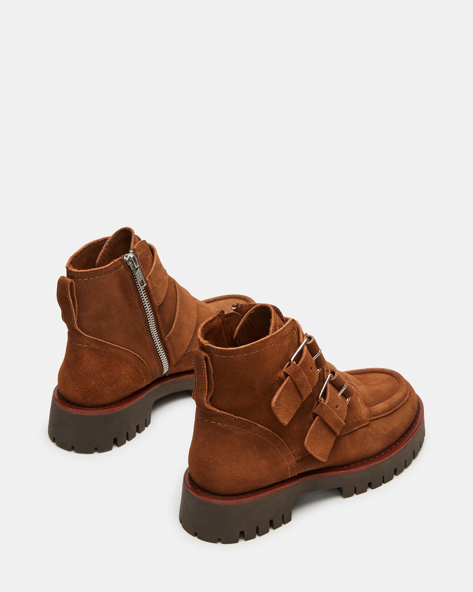 Chestnut womens ankle boots styled with jeans on a rugged California trail.