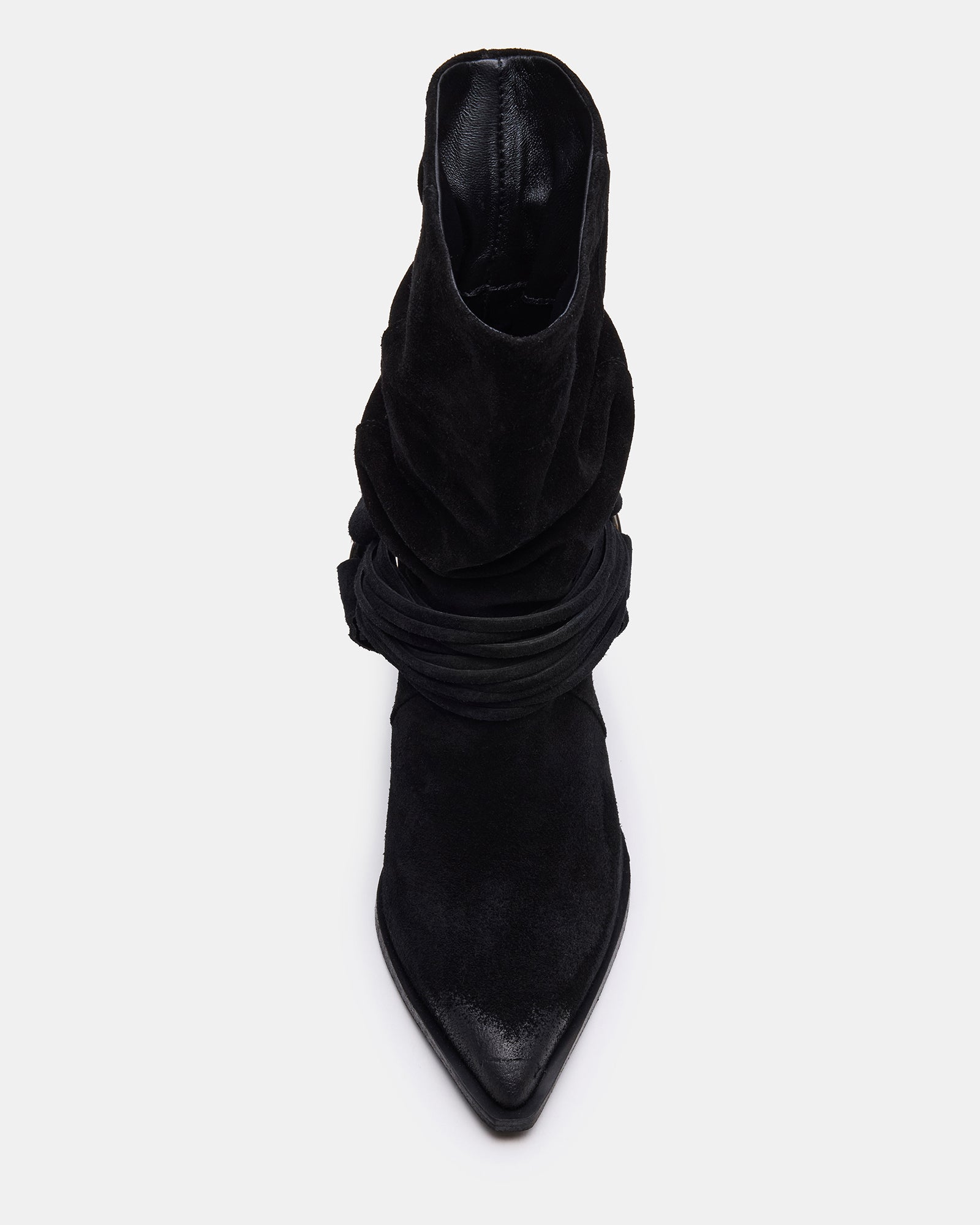Close-up of the buckles and hardware on Lauper pointed toe black boots.