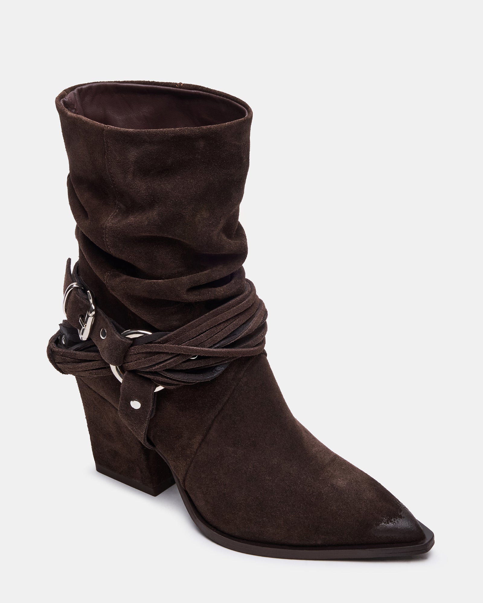 Close-up of the pointed toe design of the dark taupe ankle boots.