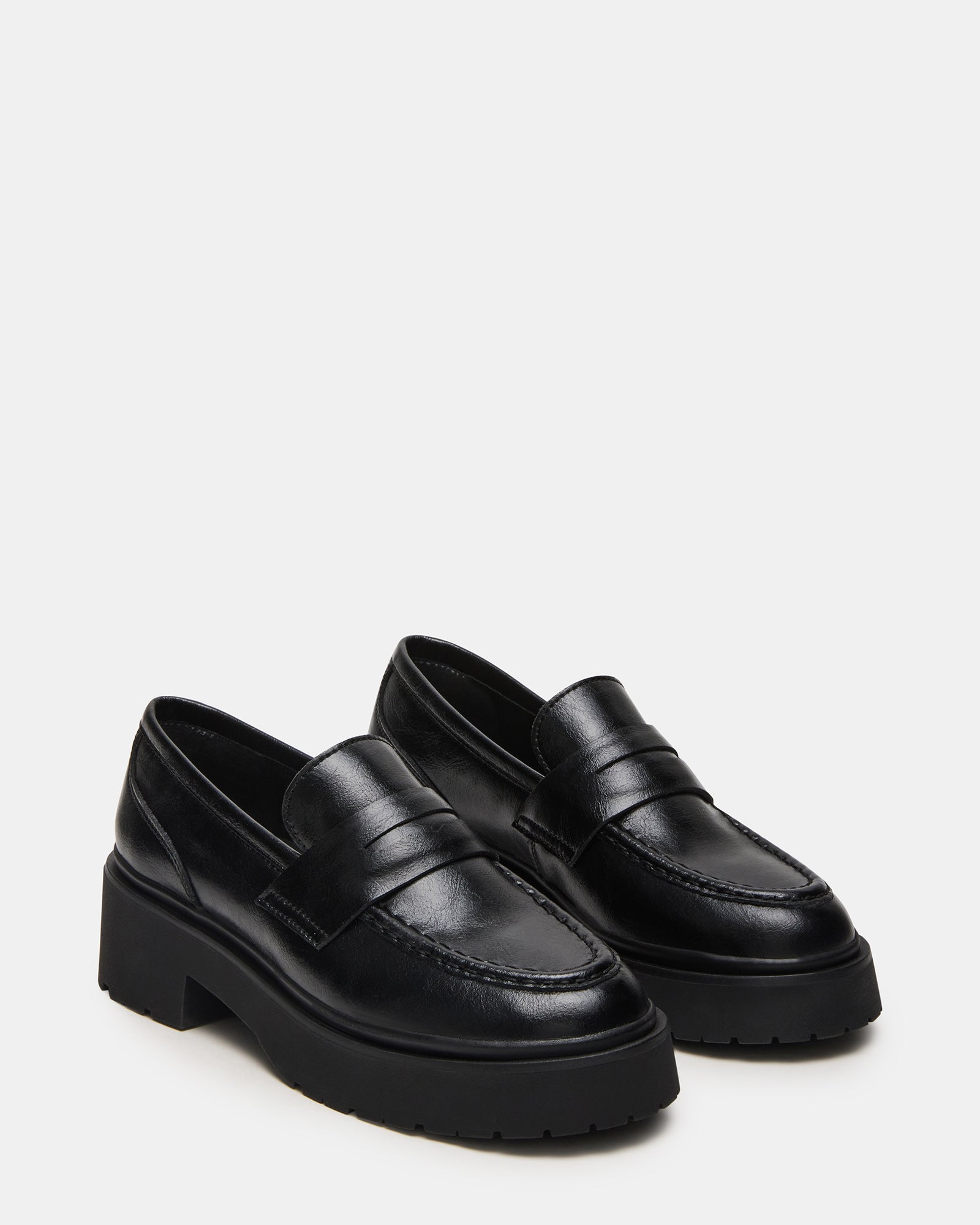 Close-up of the deep lug tread on the platform loafers