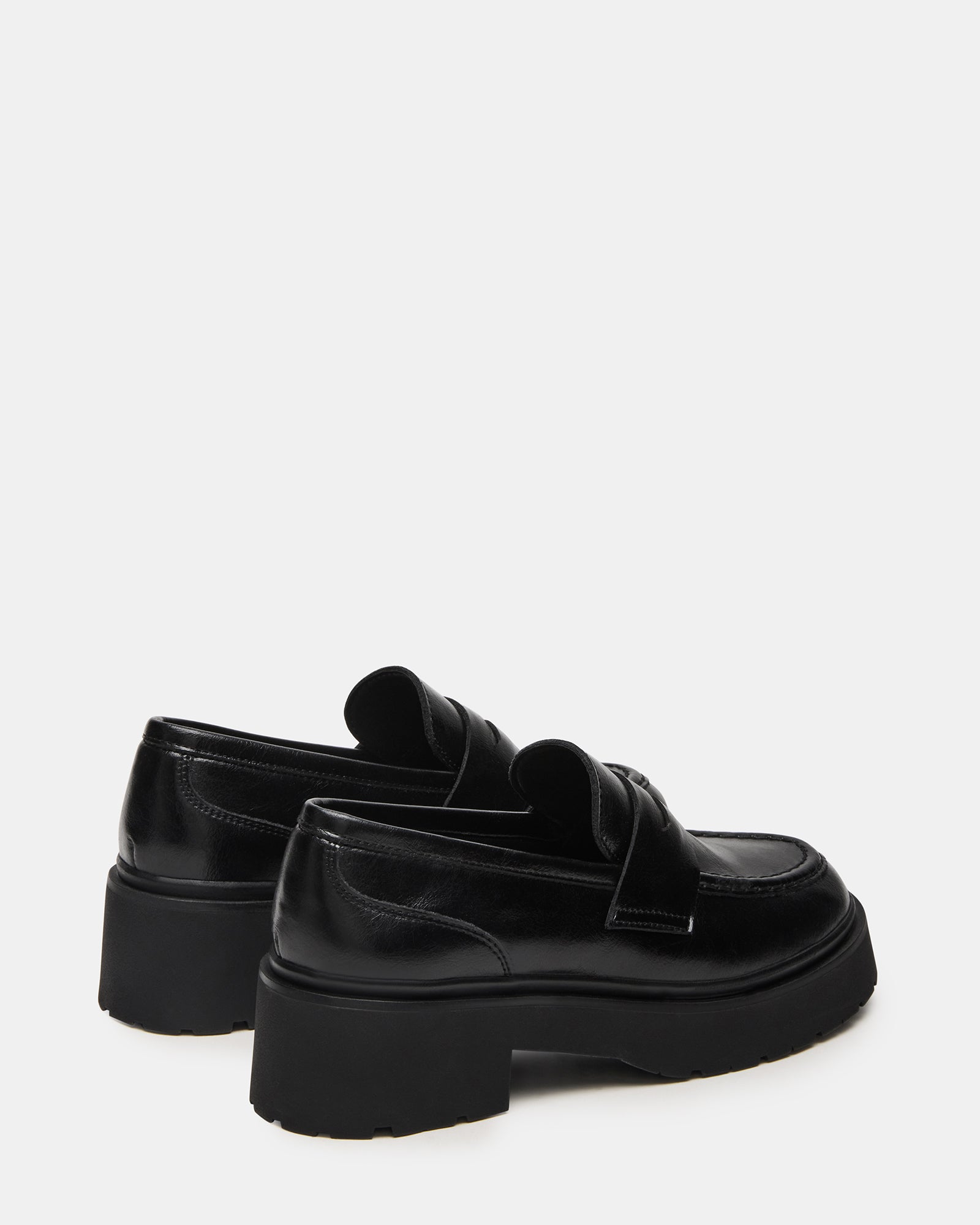 Close-up of the deep lug tread on the platform loafers
