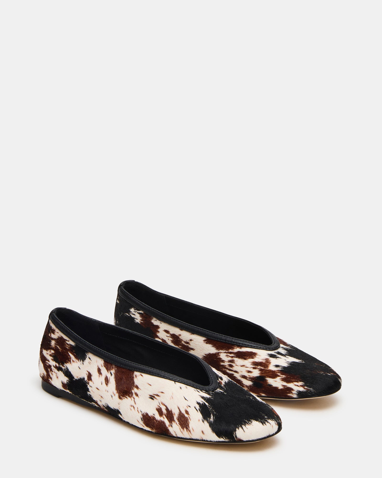 Lifestyle shot of Orinda square toe ballet flat worn in a casual city setting