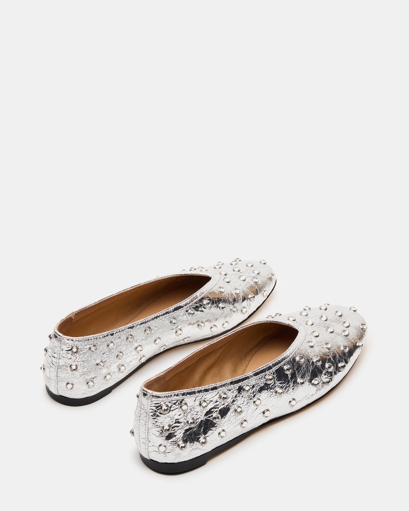 Side view of silver ballet flats perfect for casual outings.