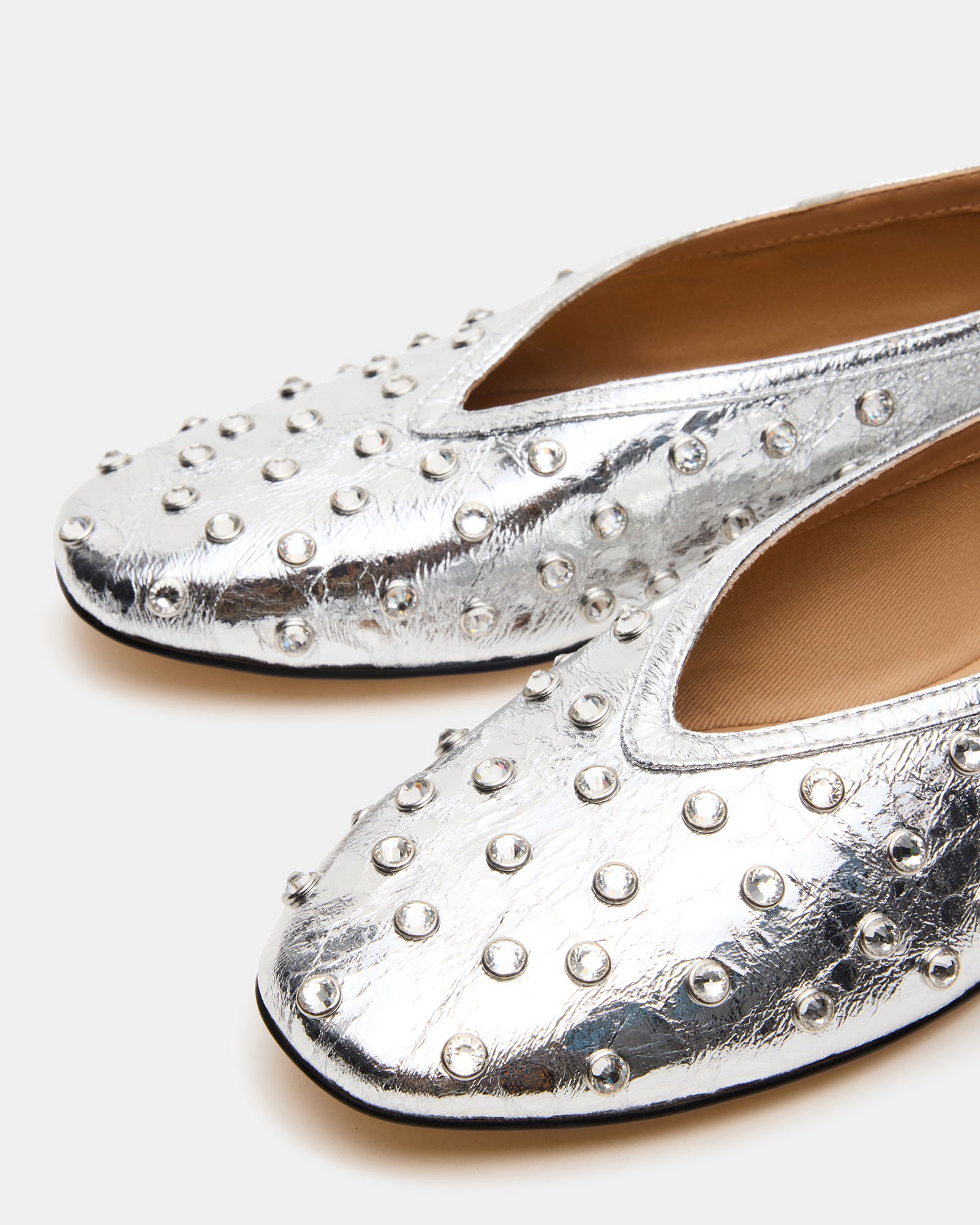 Elegant square toe ballet flats with silver metallic finish.