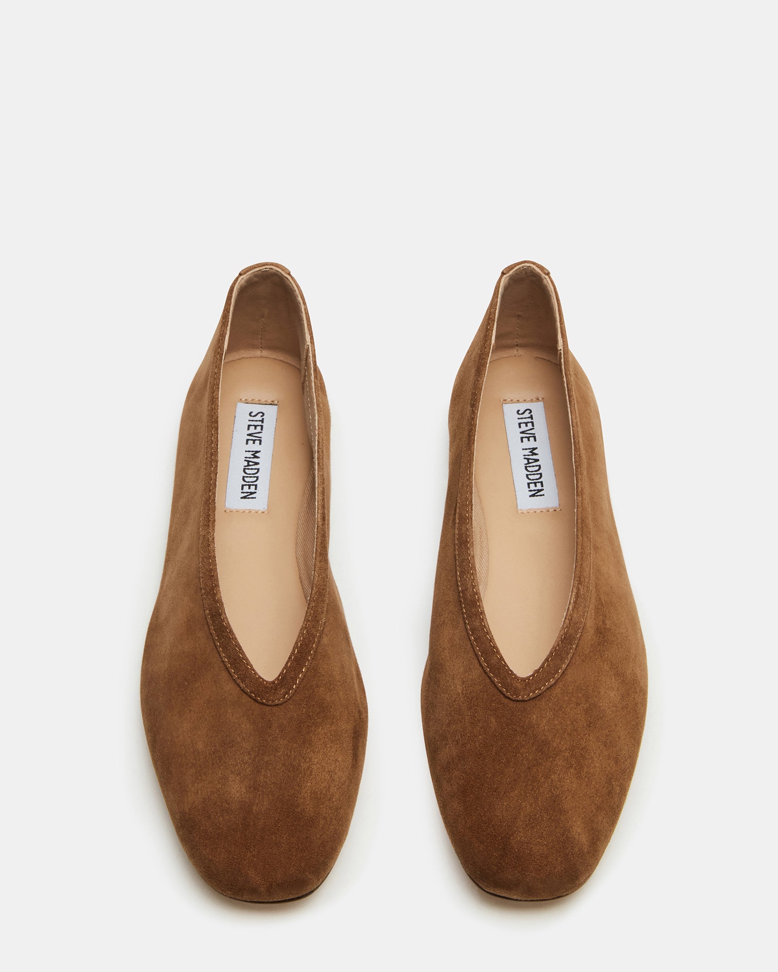 Leni brown suede ballet flats styled with casual wear for a chic look
