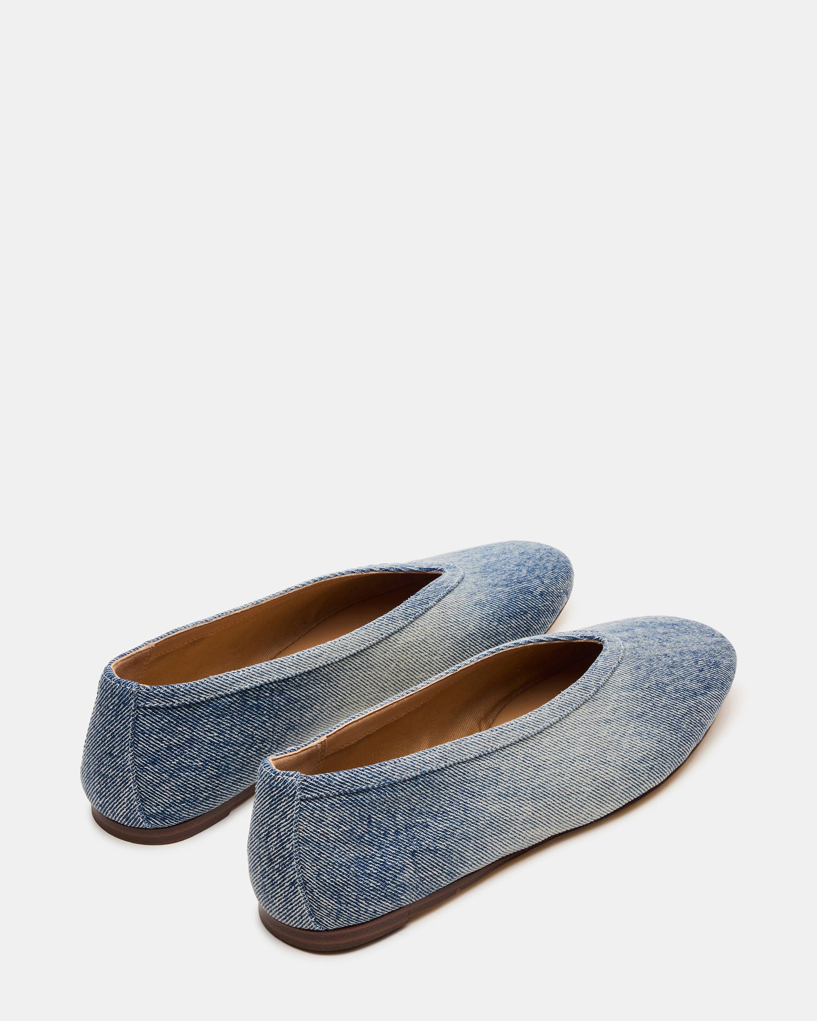 Close-up of the square toe design on LENI denim ballet flats, highlighting the sleek finish