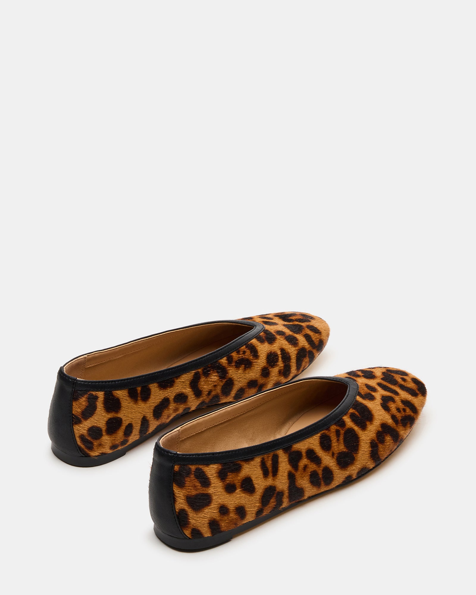 Close-up of LENI Leopard ballet flats showing the textured leather and modern style