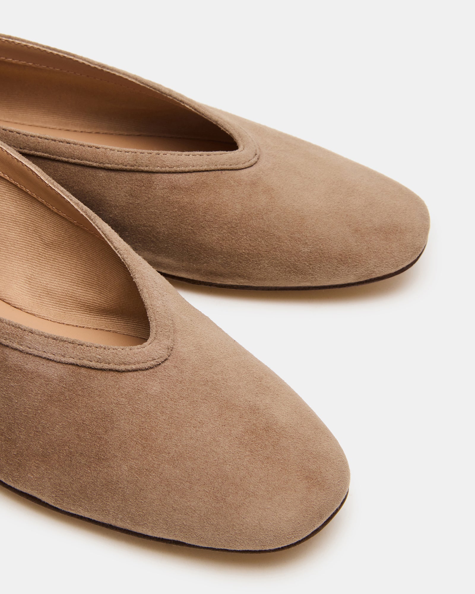 Side view of Leni taupe suede ballet flats highlighting the square toe.