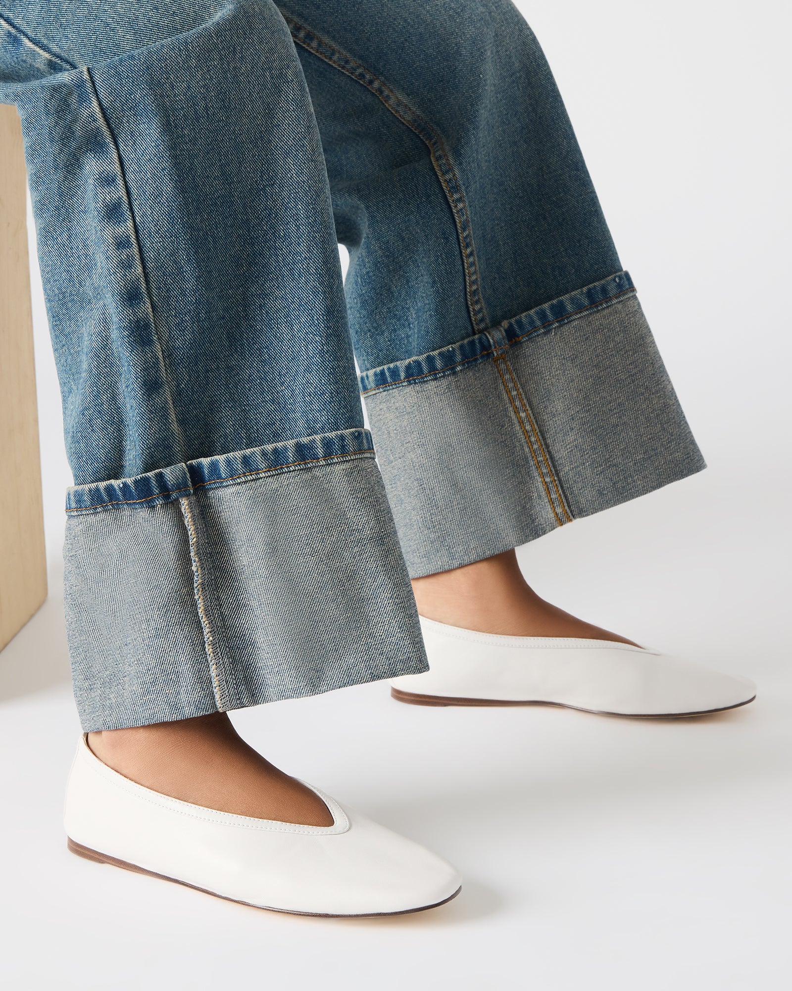 Close-up of square-toe design on LENI flats, showcasing premium stitching