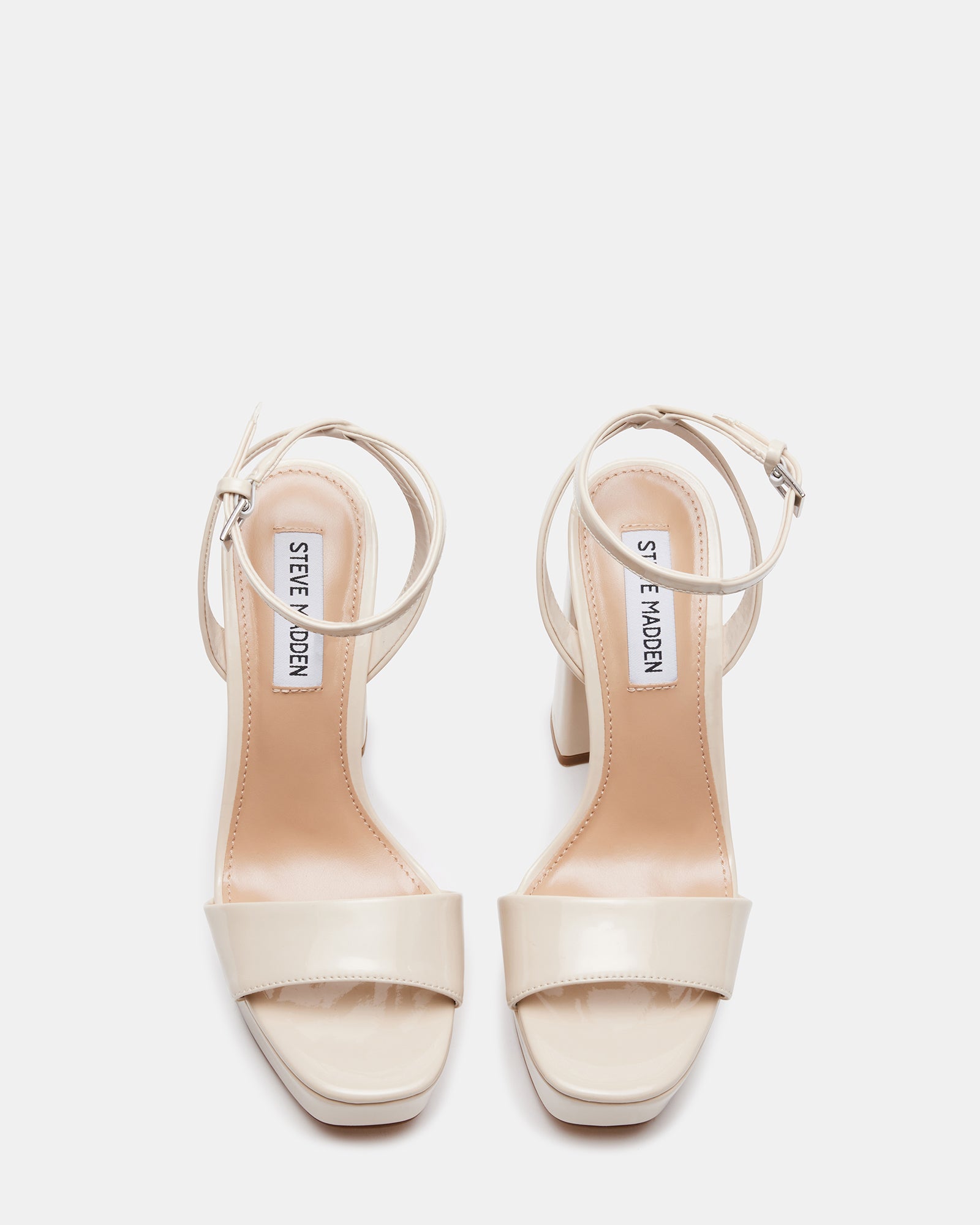 Side view of black platform sandals for women, showcasing height and style.