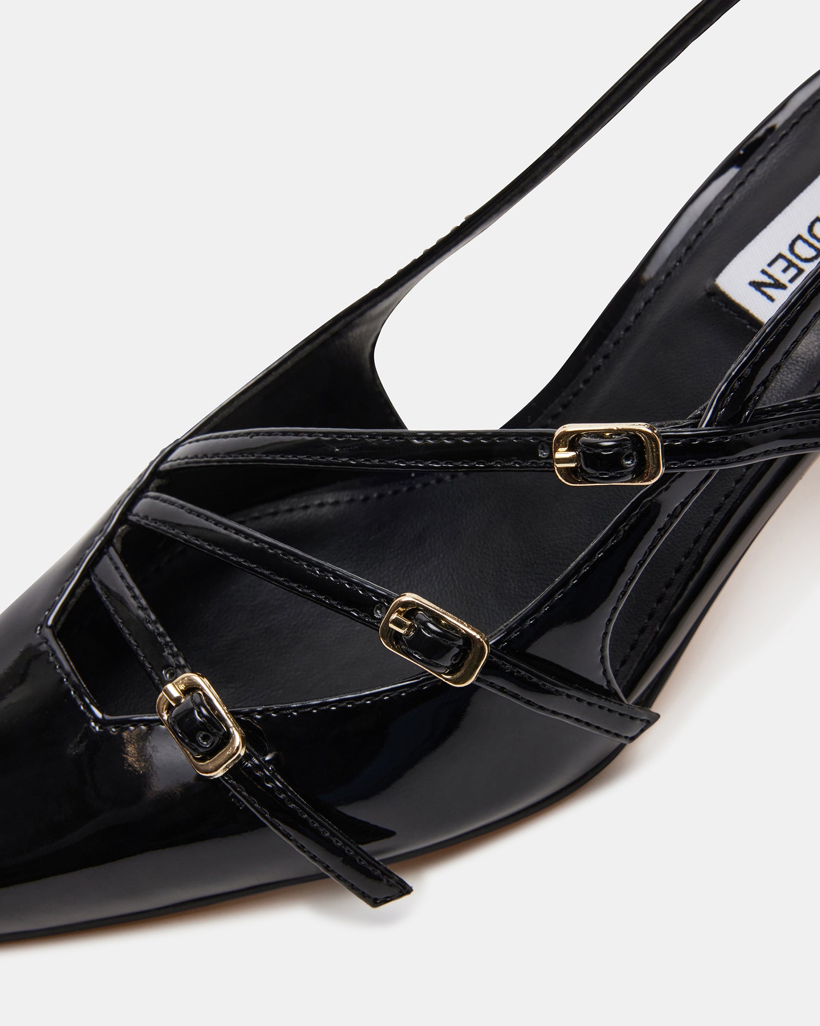 Side view of womens dress shoes with slingback strap and low heel