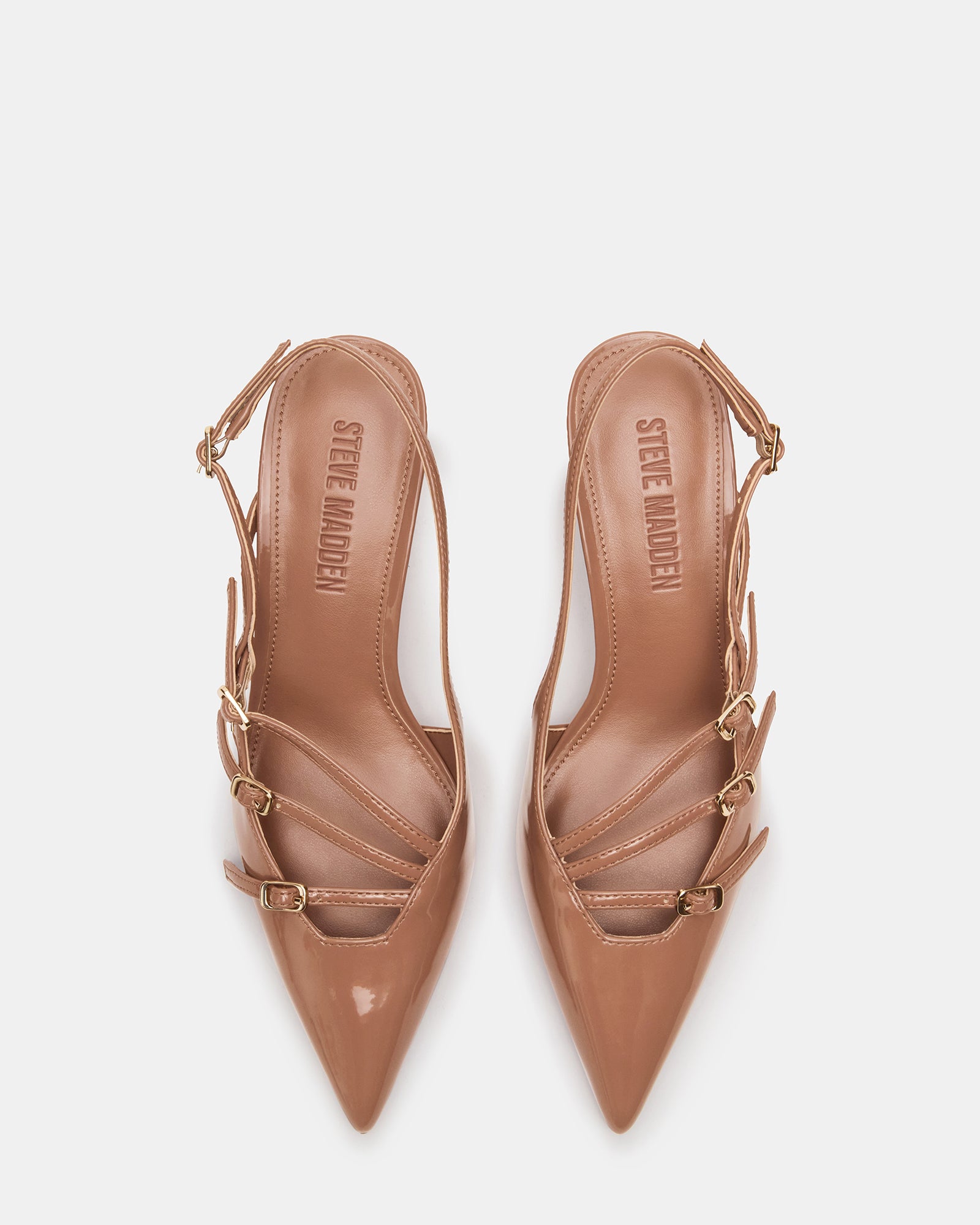 Side profile of nude slingback heels highlighting the 2.5-inch low heel