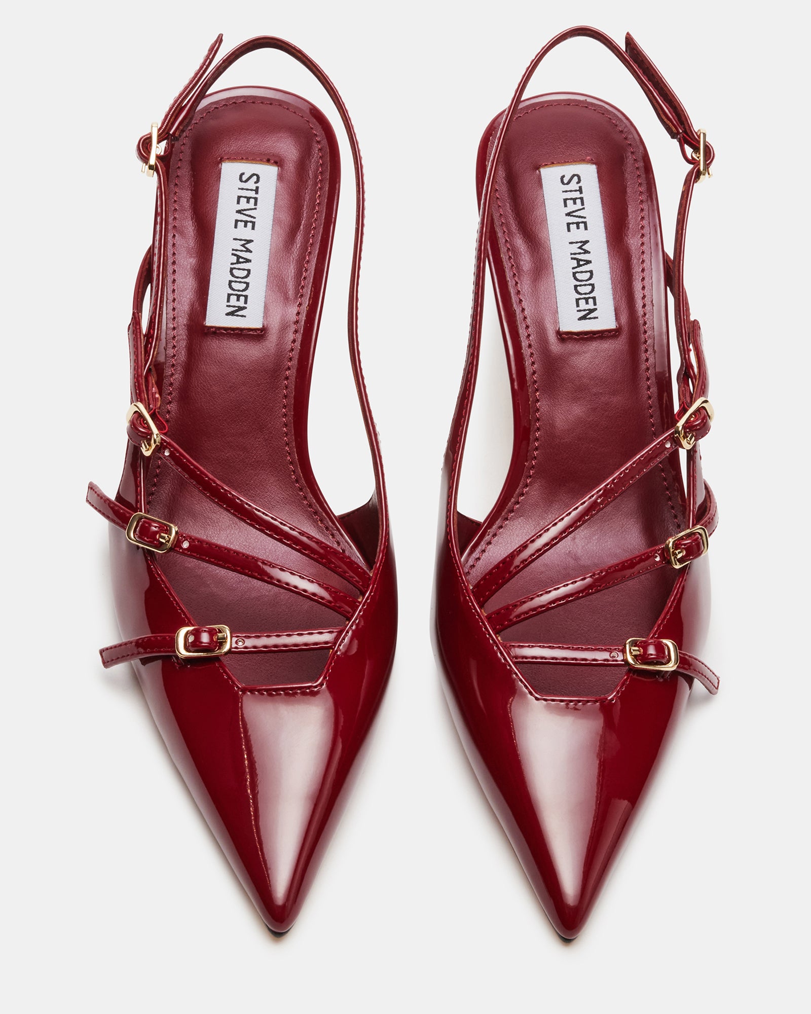 Front view of luxury womens shoes with strappy design and glossy finish