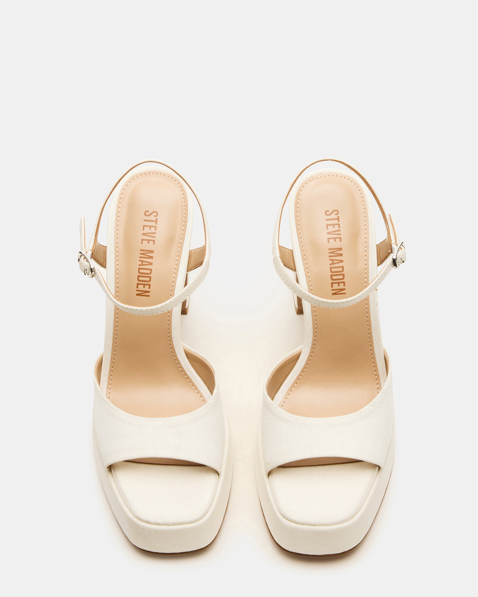 Side view of ivory satin platform block heels perfect for evening wear.