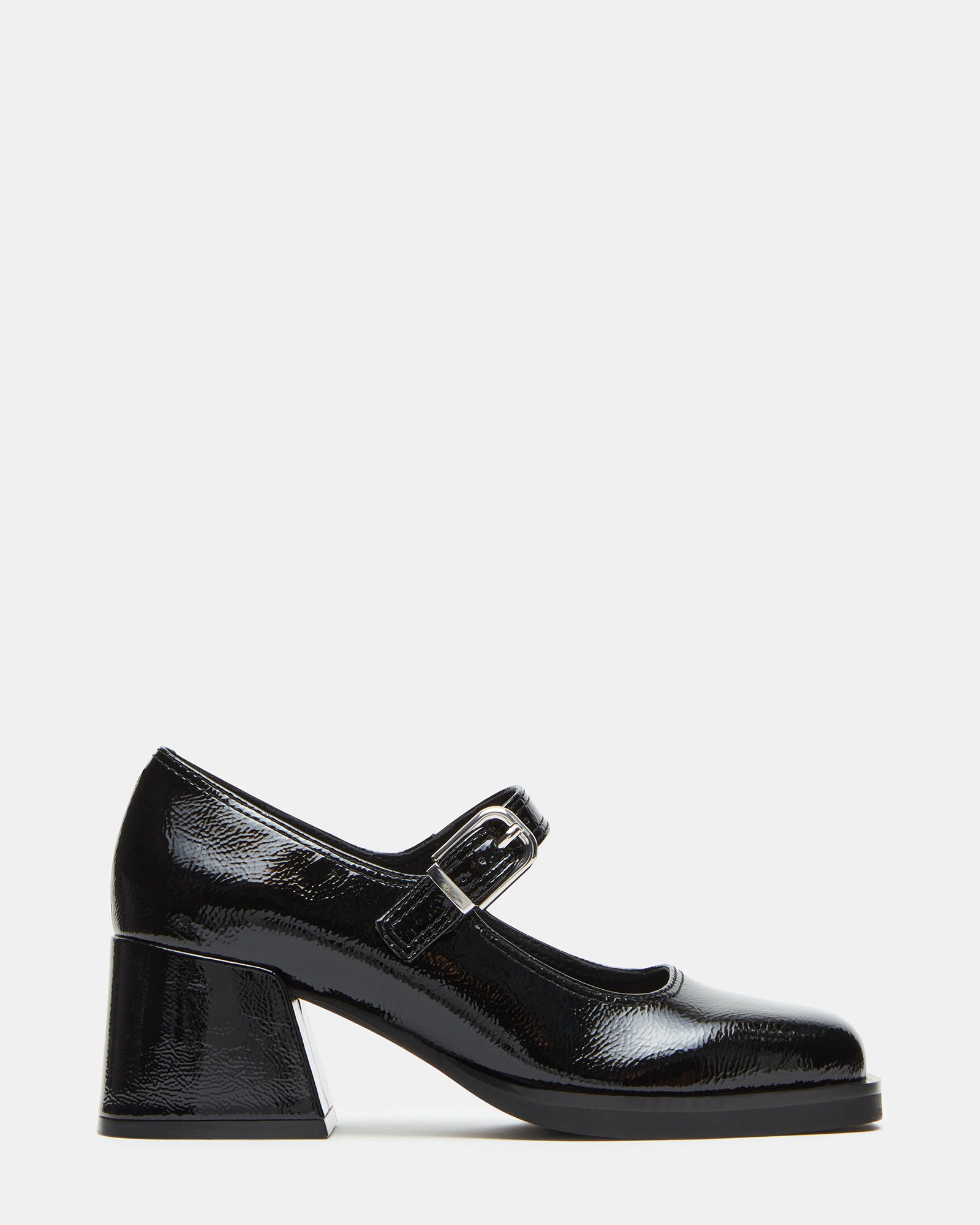 Side view of mens black loafers on a wooden bench