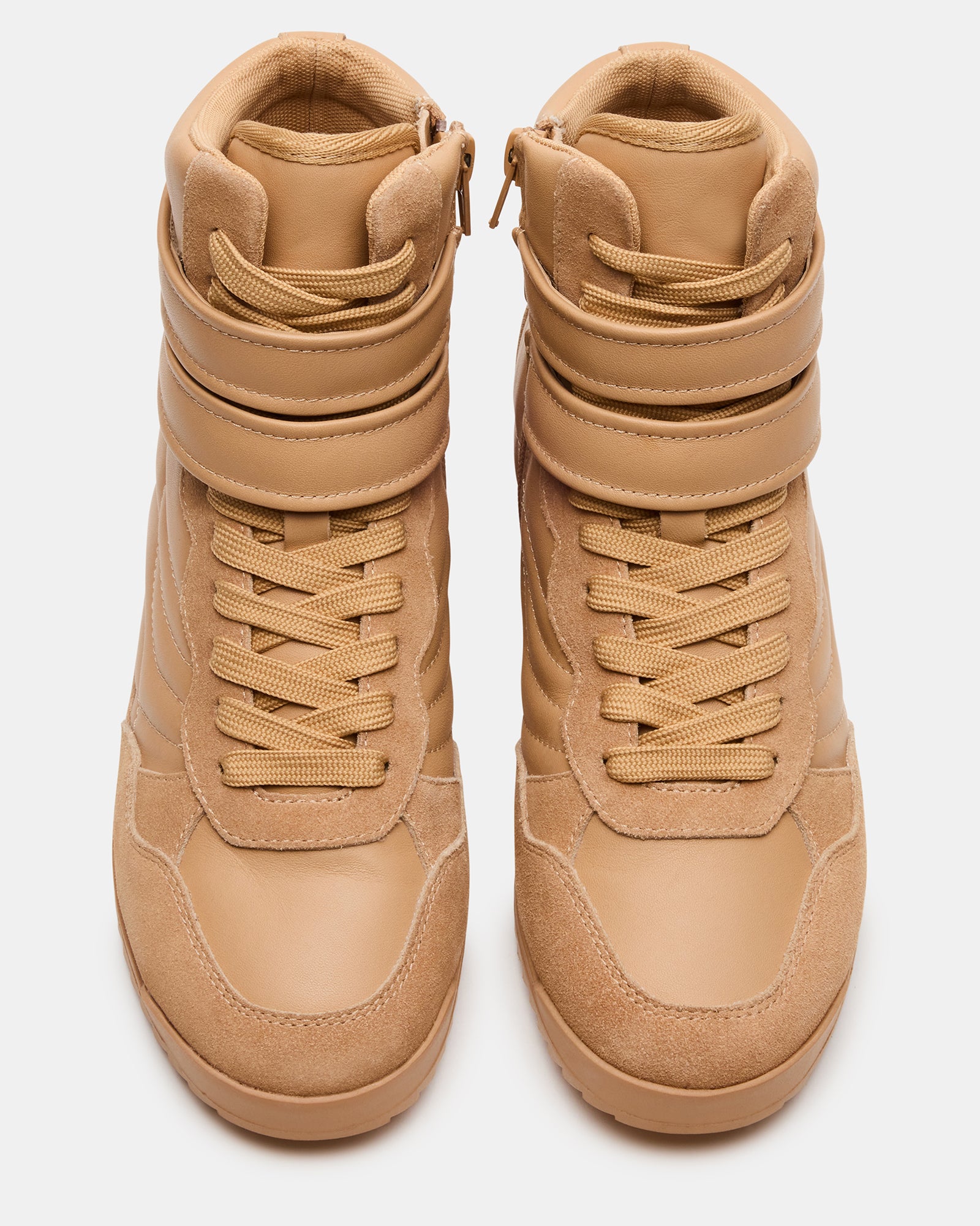 Liftoff tan leather high-top sneakers side view on cobblestone