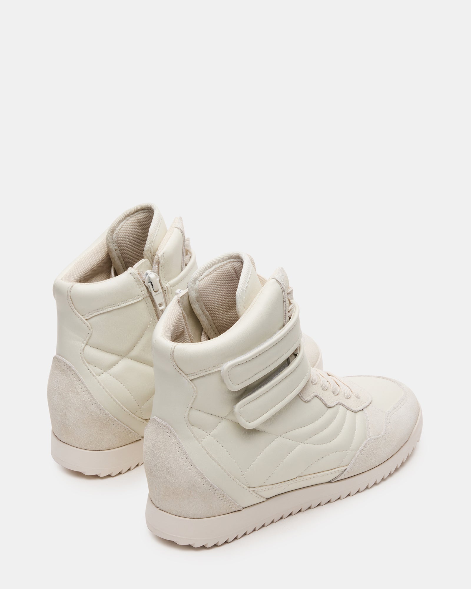 Comfortable white leather nursing shoes for all-day wear.