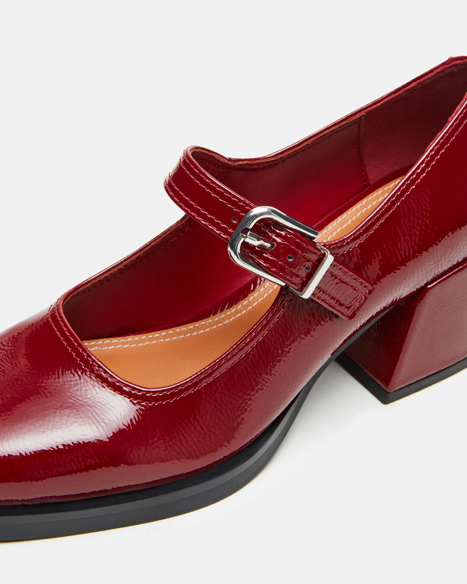 Model wearing comfortable work shoes heels at the office.