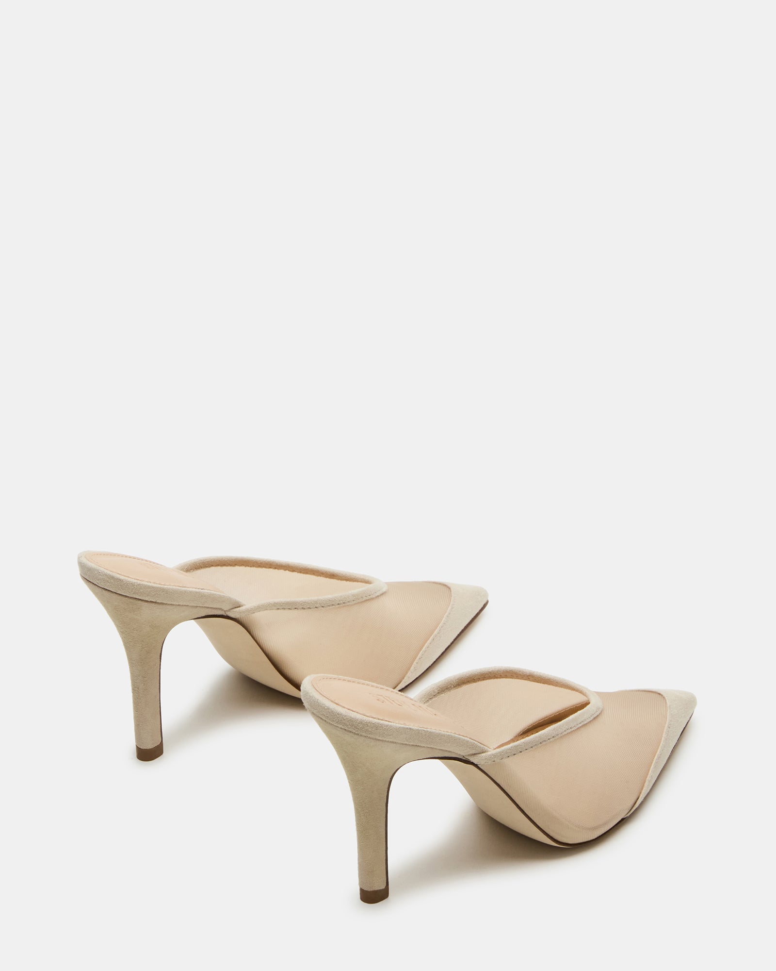 Top-down angle showing pointed toe mule block heel and suede texture