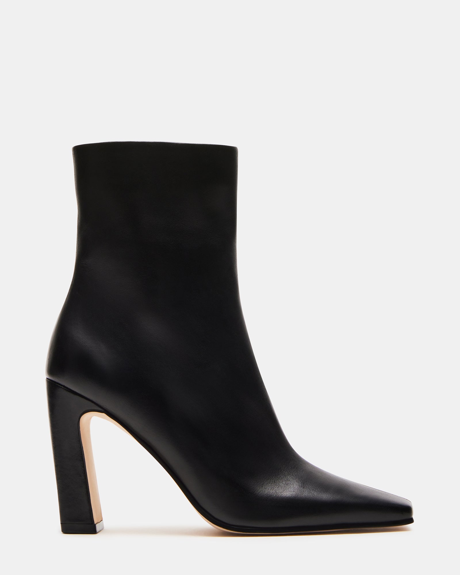 Top-down view of black ankle boots highlighting square toe design.