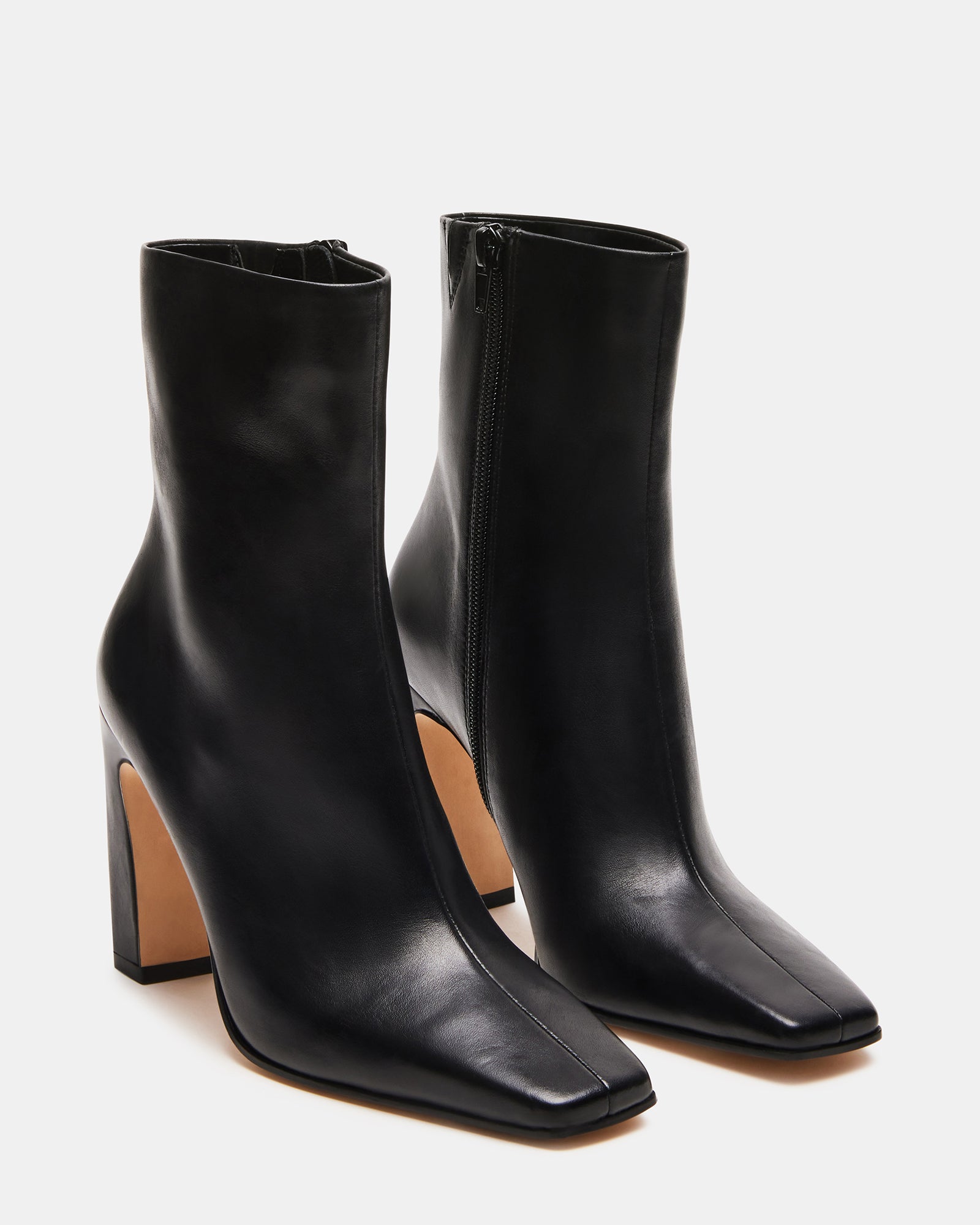 Lifestyle shot featuring UGG ankle boots paired with fall wardrobe essentials.