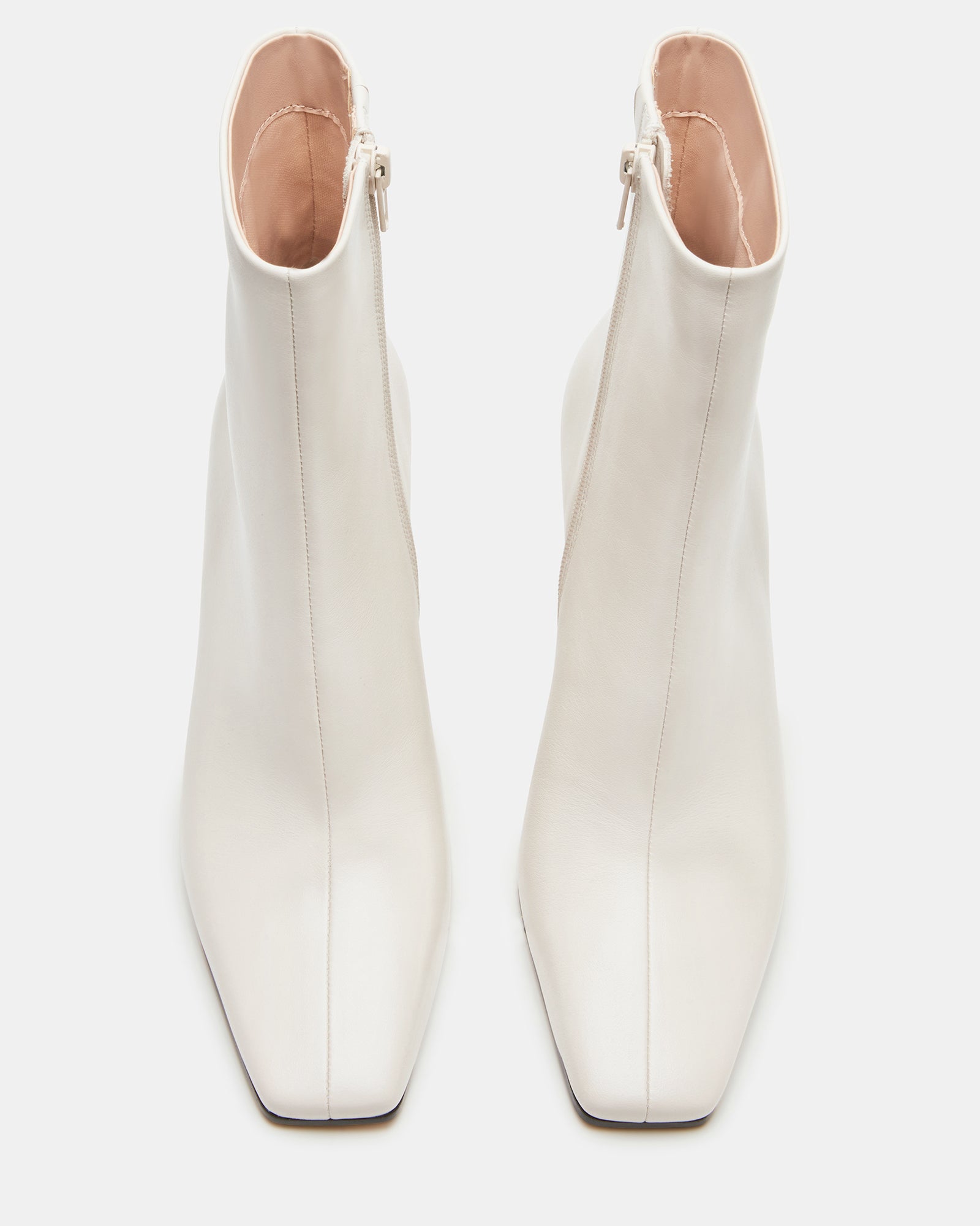 Close-up of the square toe design of bone leather booties.