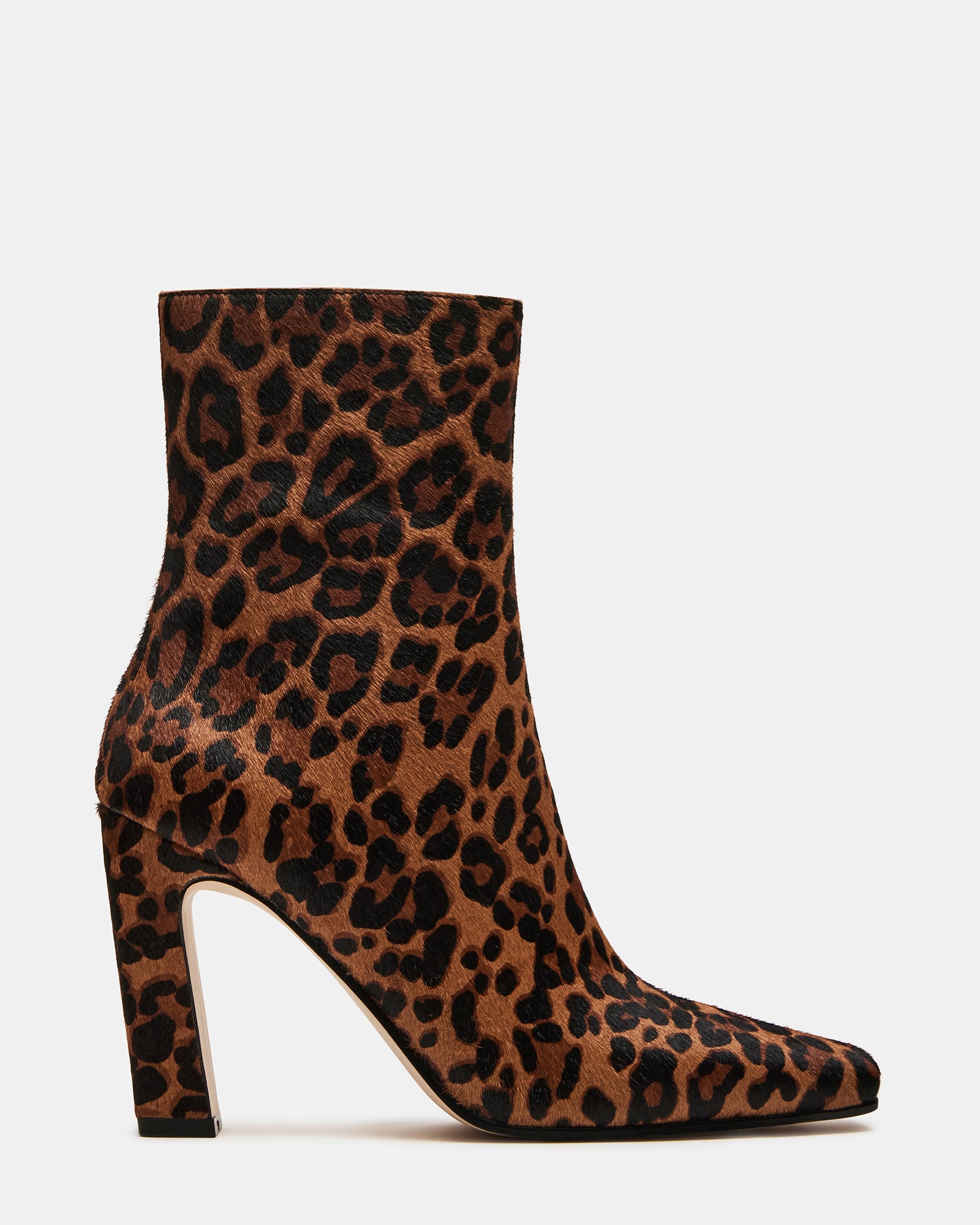Side angle of Lizabelle ankle boots styled with jeans