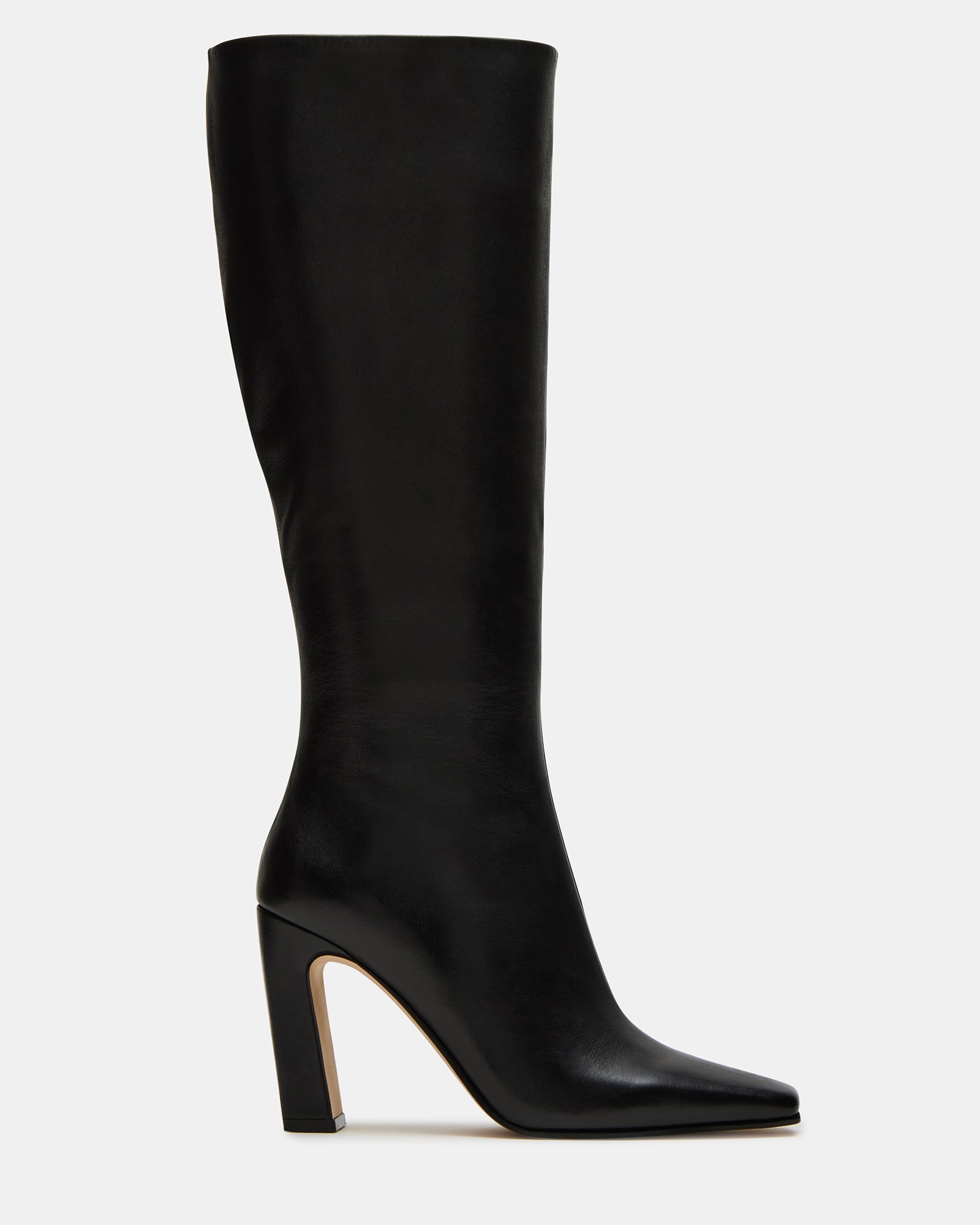 Lizette black leather boots styled with skinny jeans for a chic urban look.