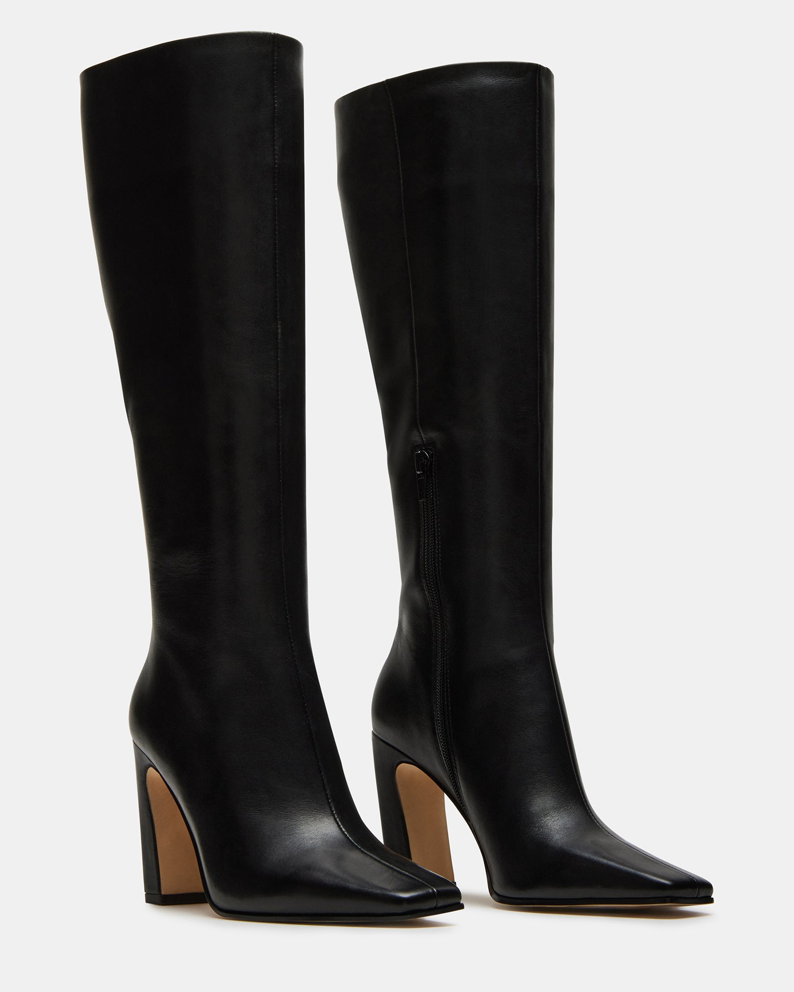 Side profile of the boots showing heel height and shaft fit.