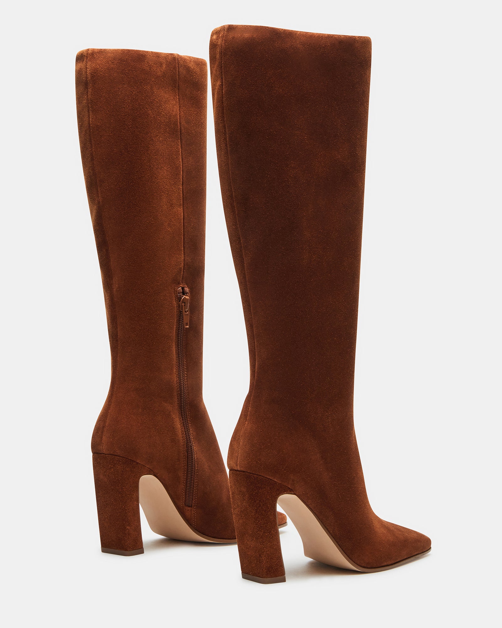 Close-up of heel and sole of Lizette Cognac Suede boots, emphasizing quality craftsmanship