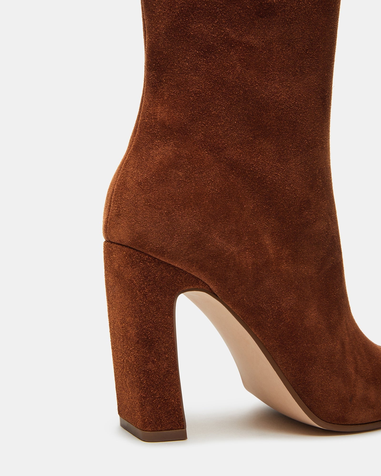Side view of Lizette Cognac Suede knee-high boots highlighting the tall shaft and square toe