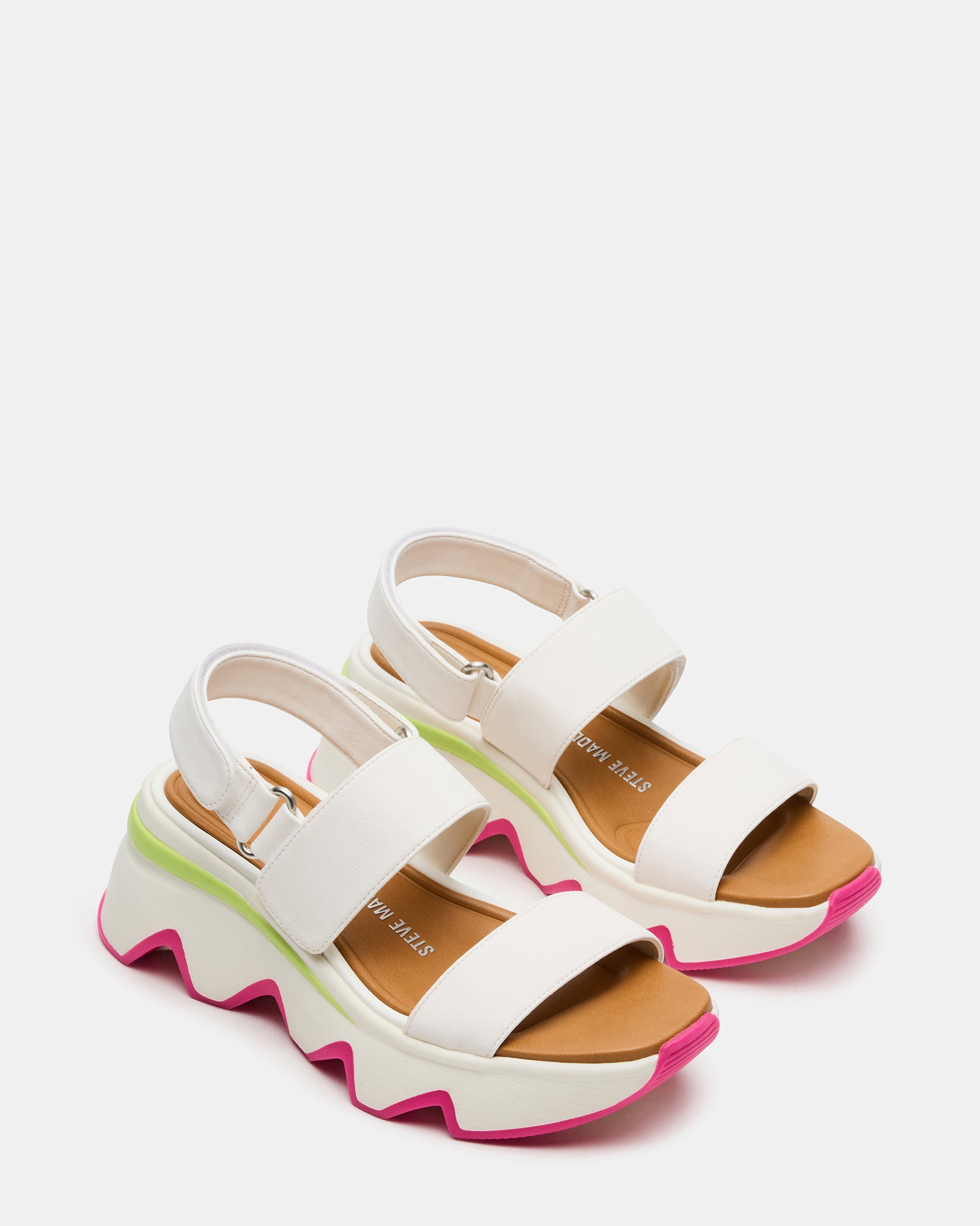 Side view of platform sandals showcasing the 2.5-inch heel and strappy design.