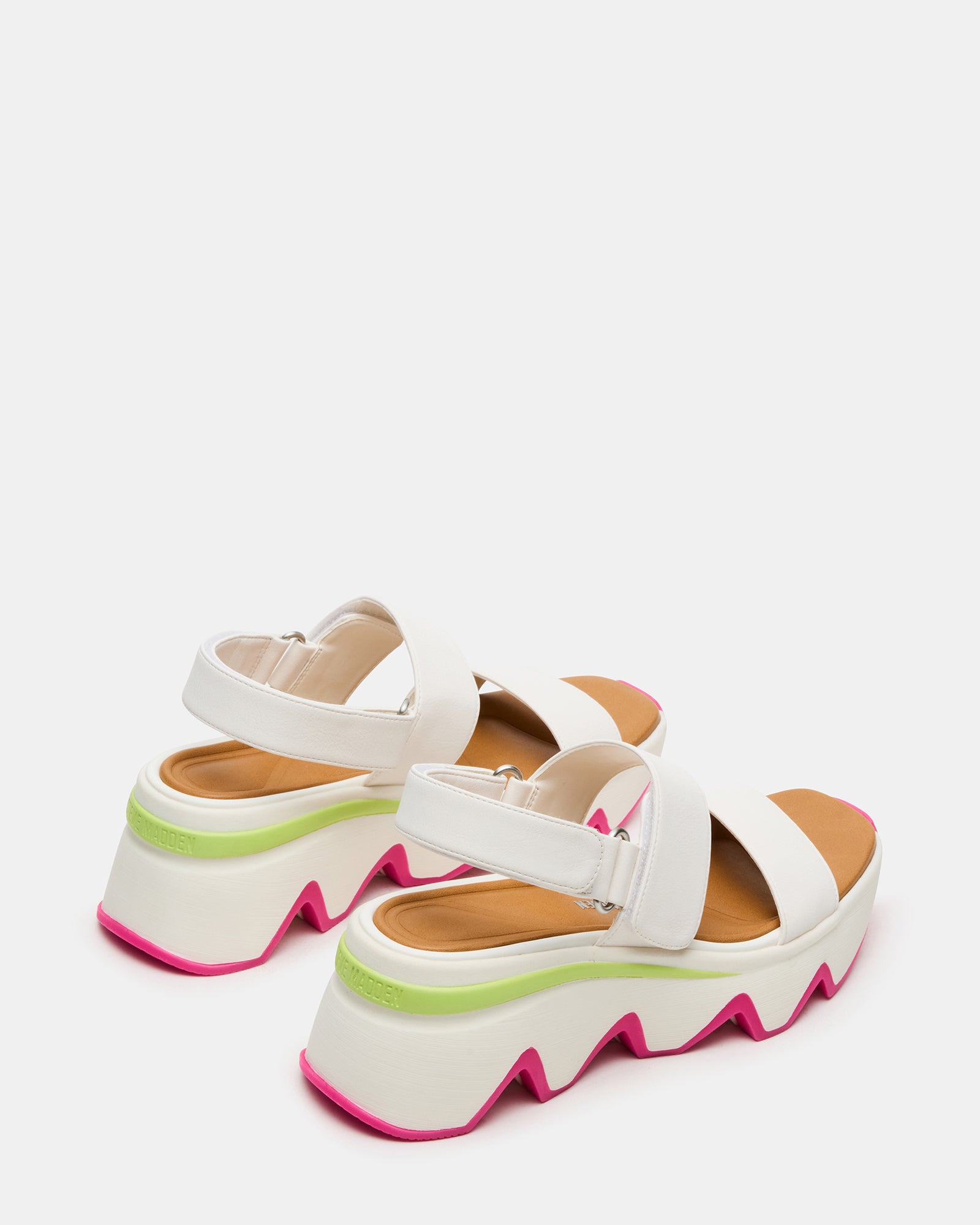 Side view of platform sandals showcasing the 2.5-inch heel and strappy design.
