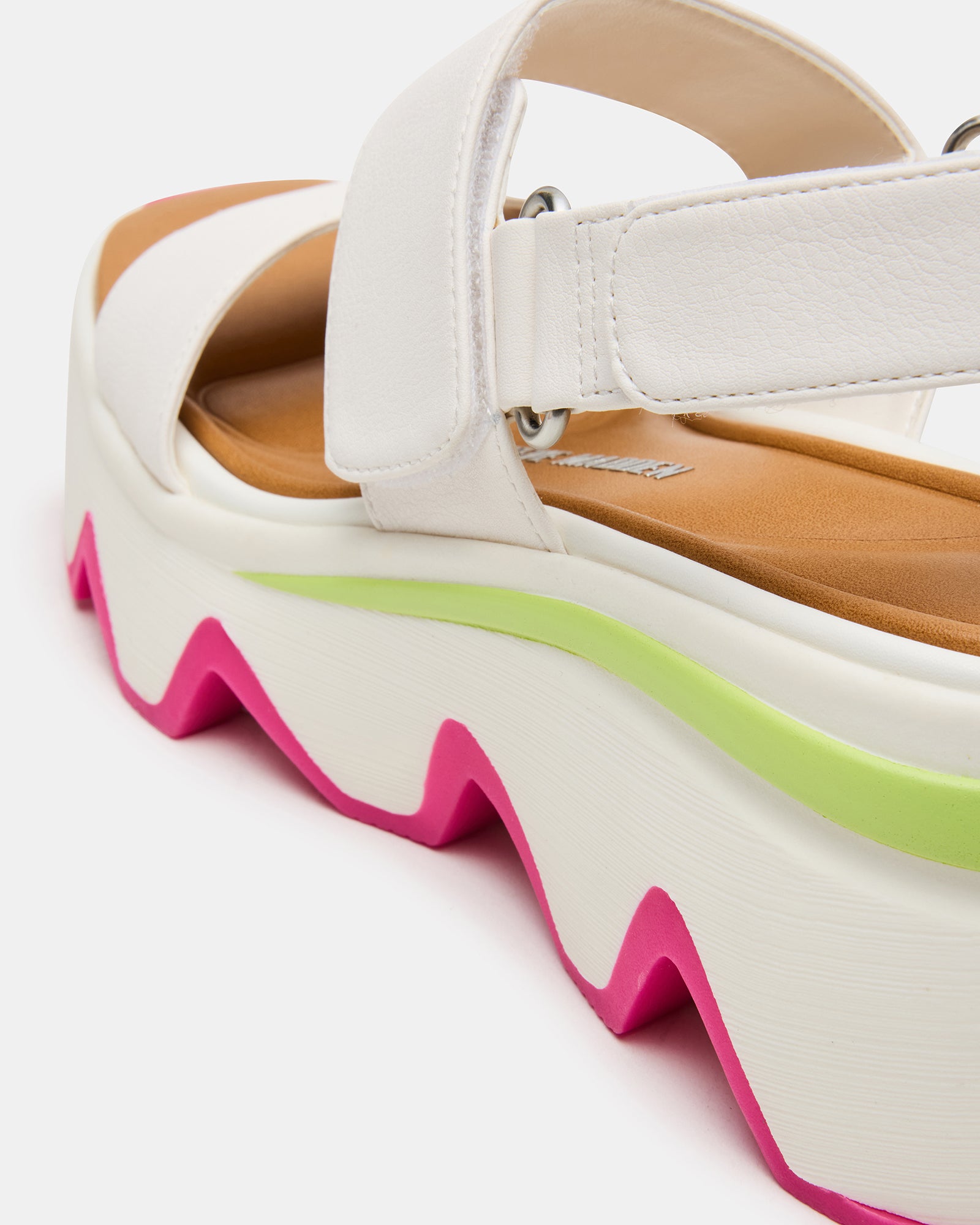 Lochan Bone sandals paired with a summer dress, perfect for outdoor occasions.