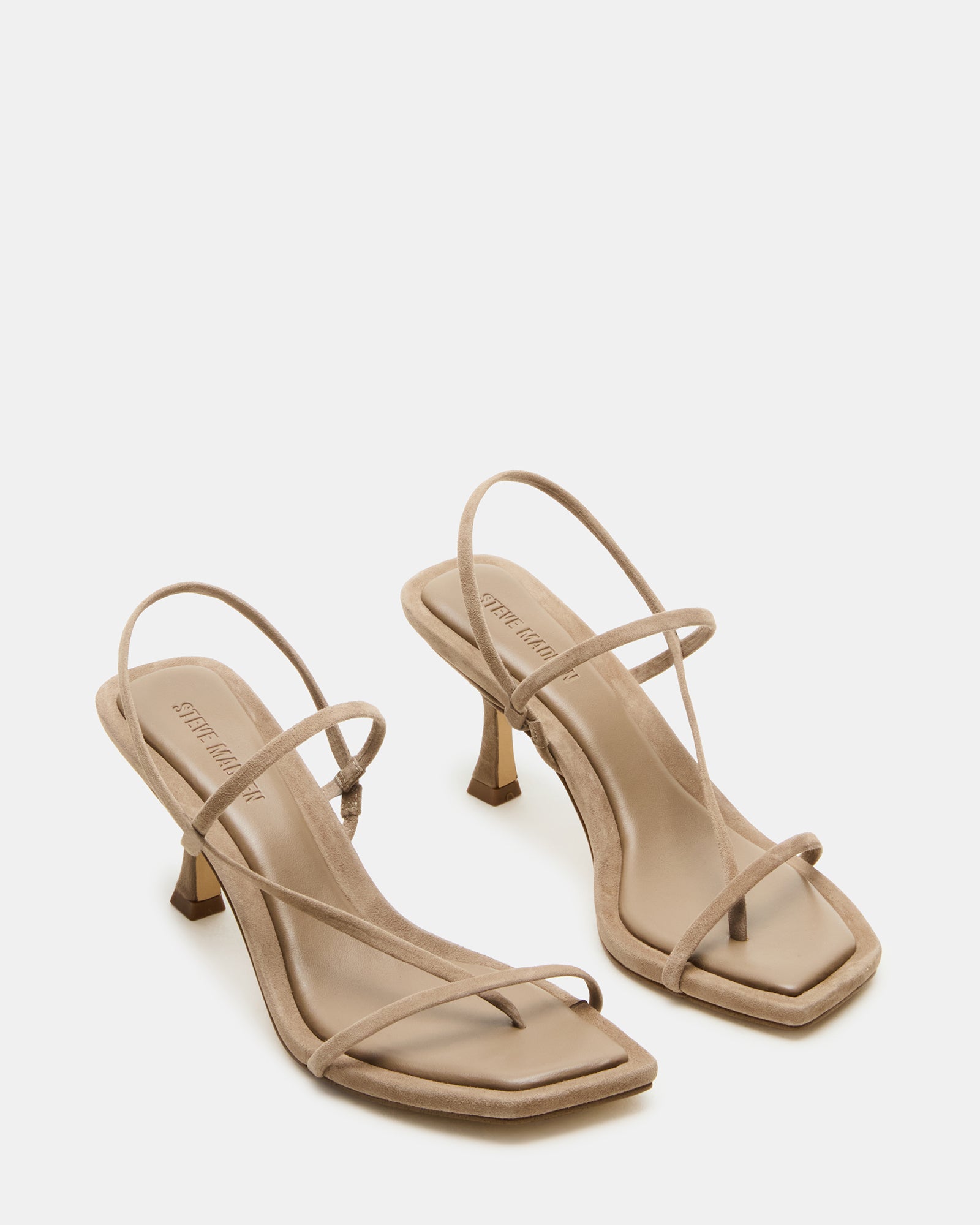 Close-up of the strappy detail on taupe heels, ideal for formal or casual wear