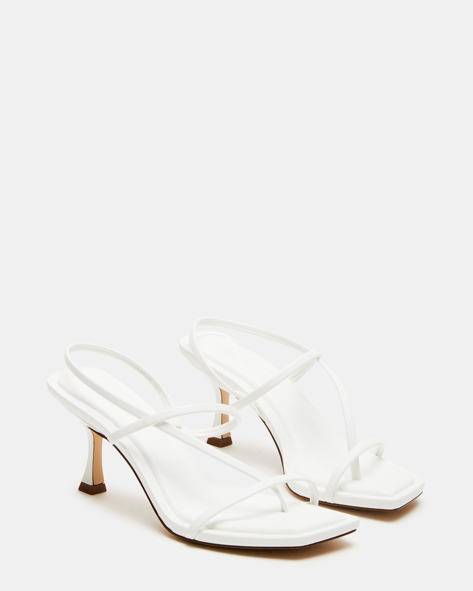 Model wearing heels with midi dress for brunch-ready style